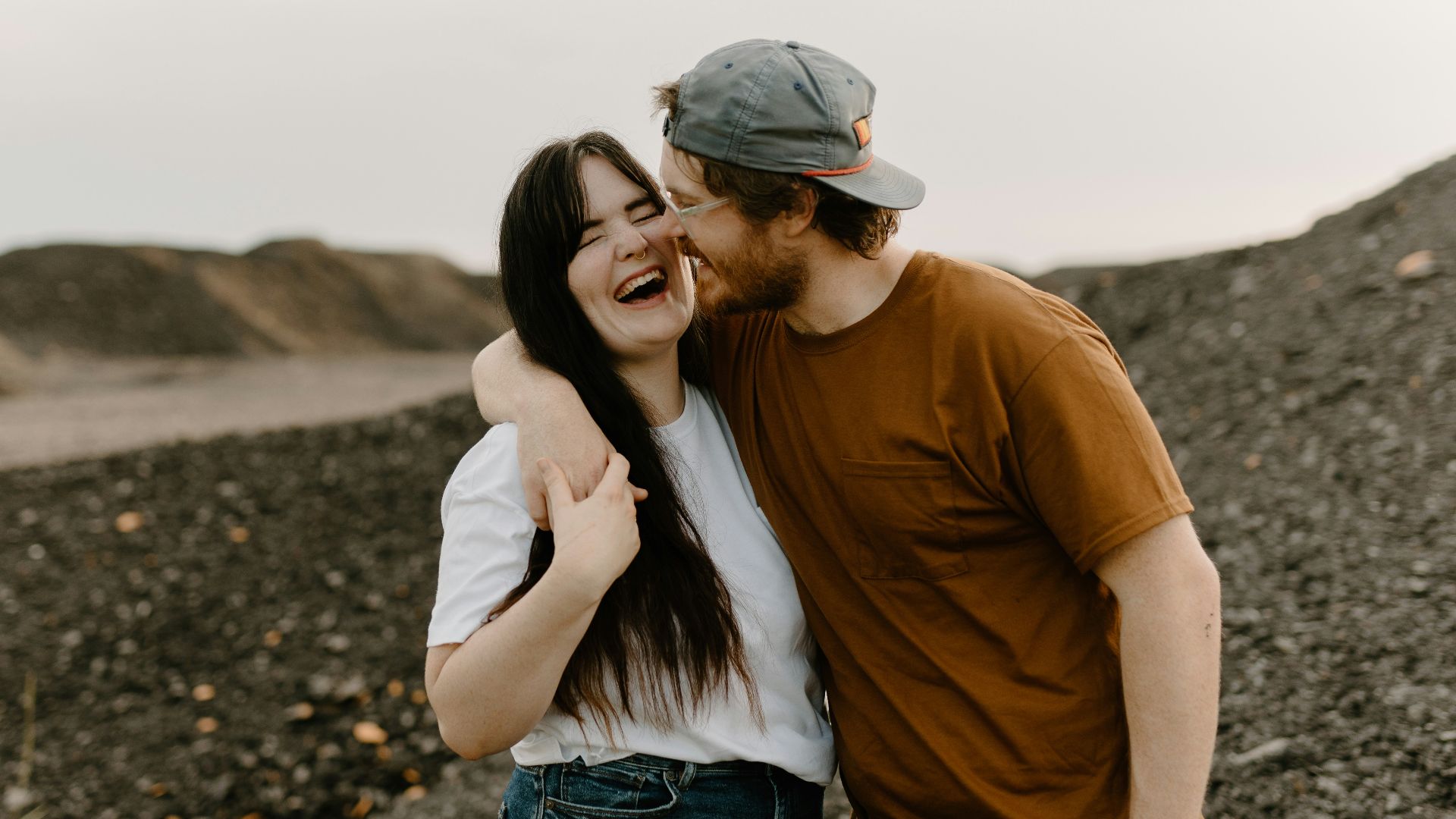 a man and a woman standing next to each other