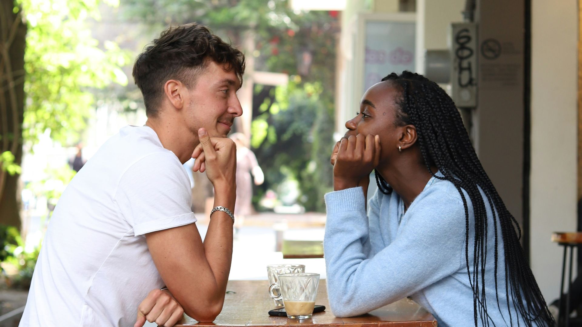 a man and a woman sitting at a table
