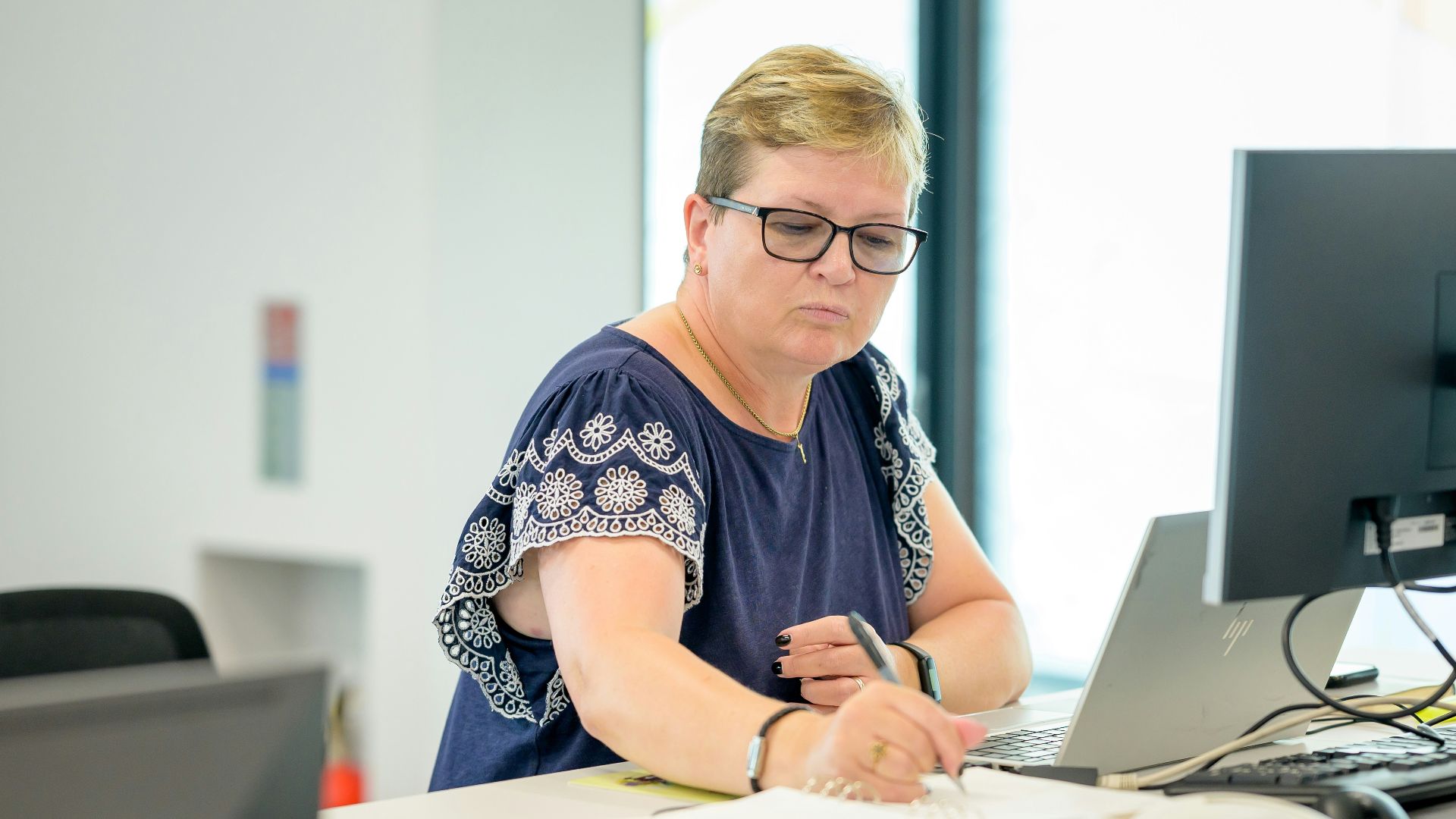 a person sitting at a desk