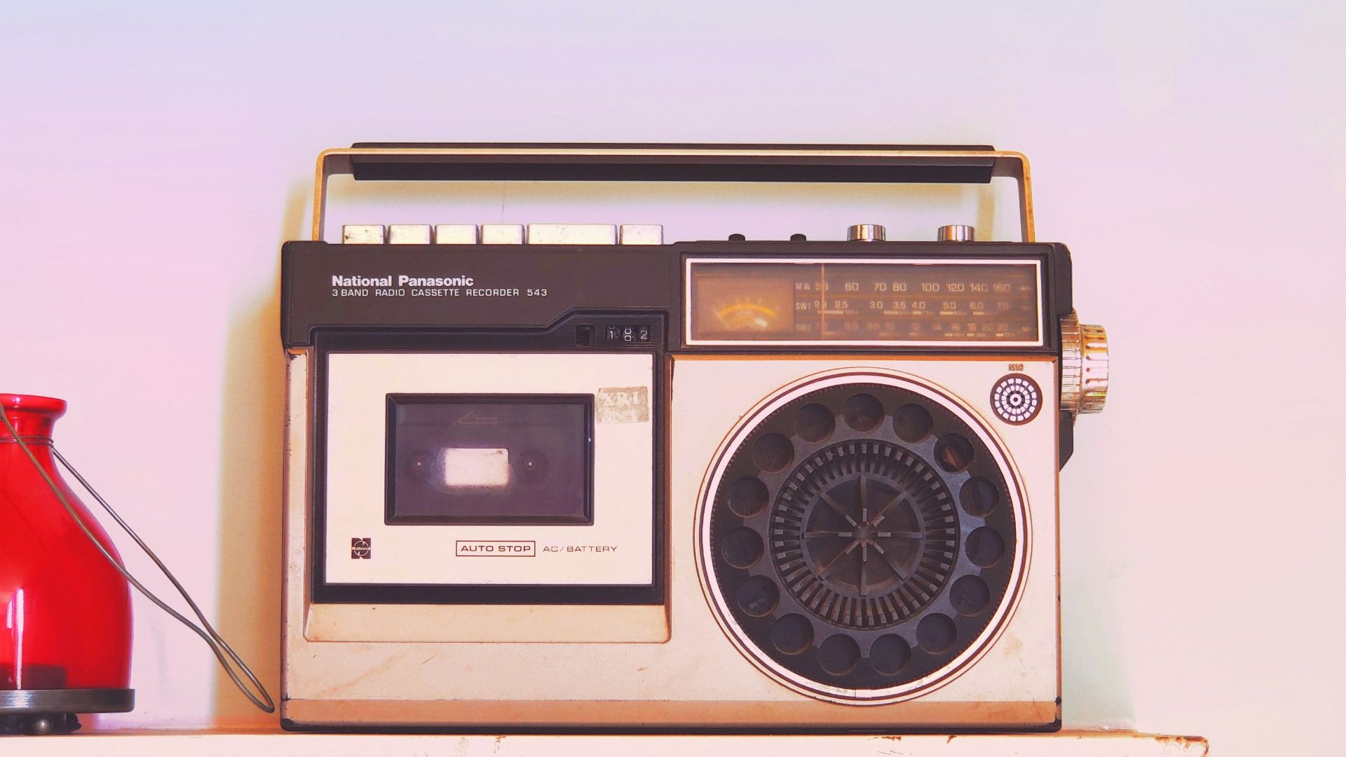 brown and black radio on white table