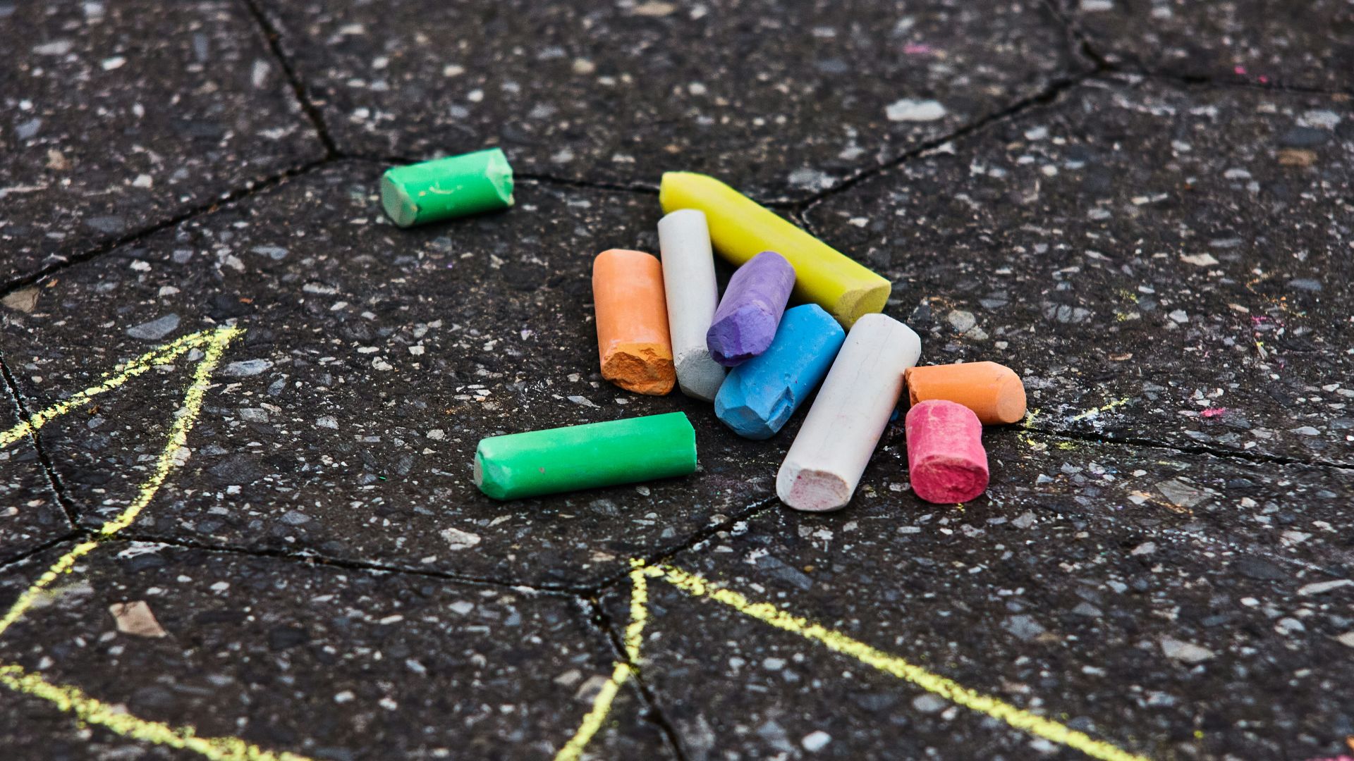 green blue and pink medication pill on black surface