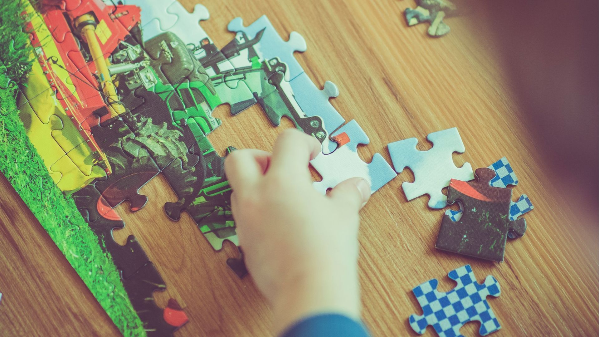 boy playing puzzle