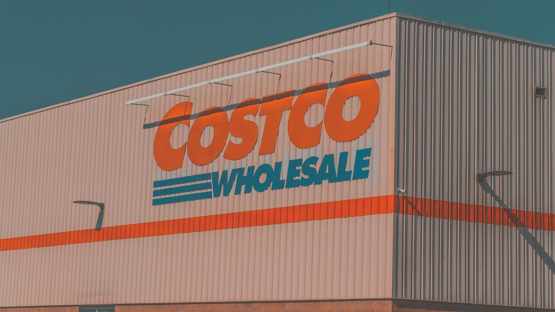a building with a sign that says costco whole sale