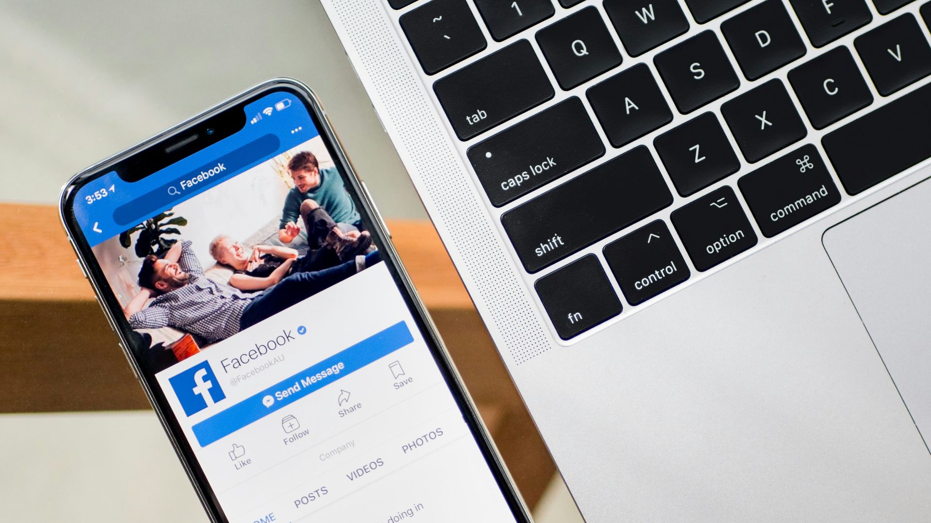 iPhone X beside MacBook