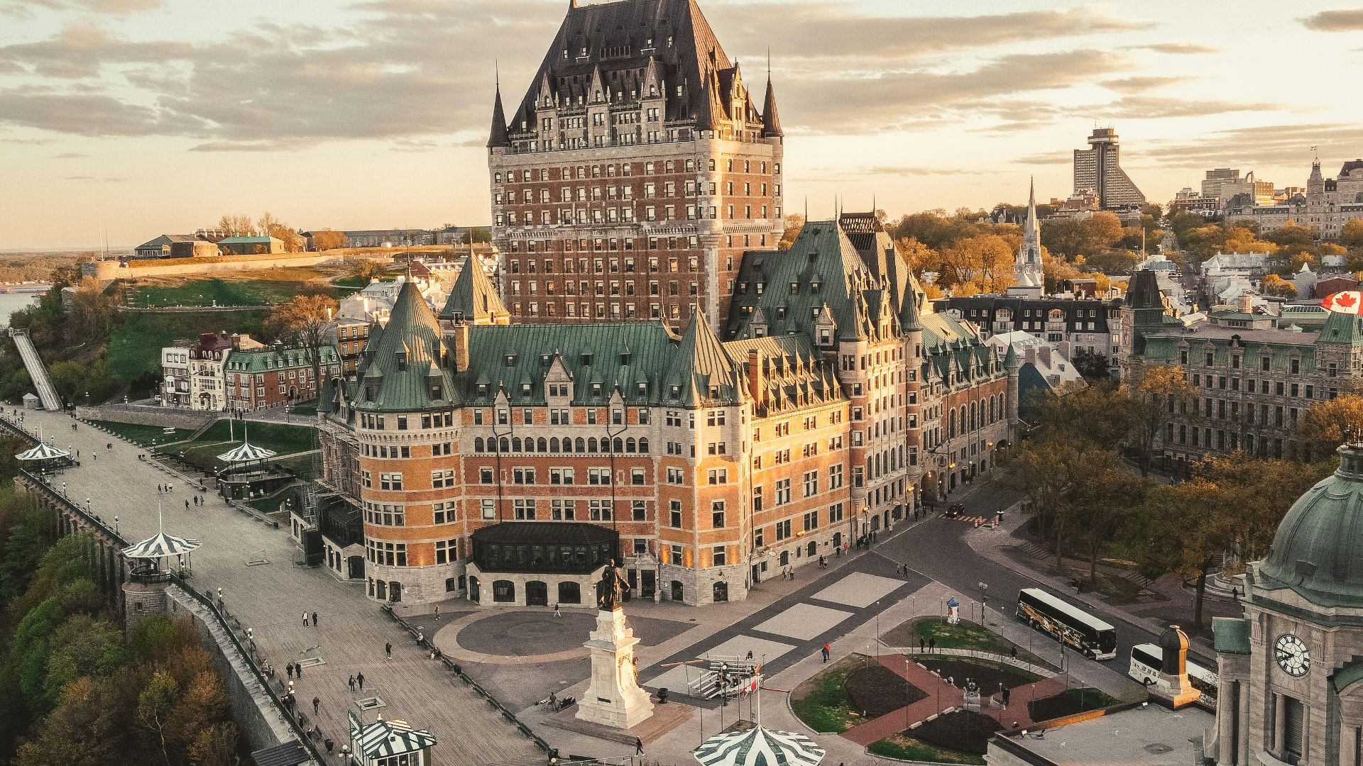 an aerial view of a large building with a clock tower