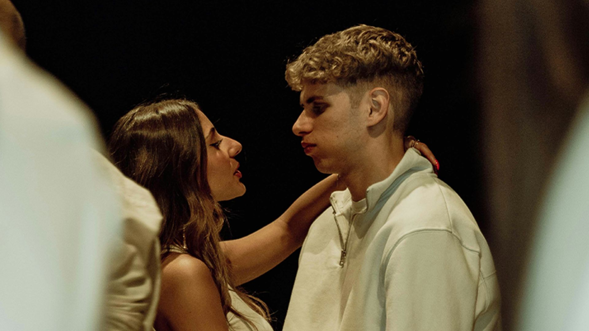 A young couple shares an intimate moment.