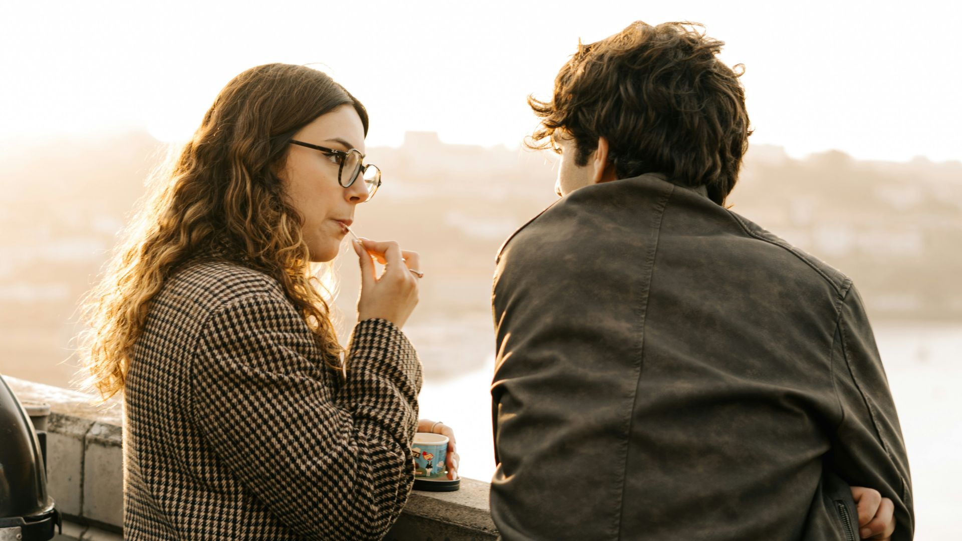 A man and a woman standing next to each other