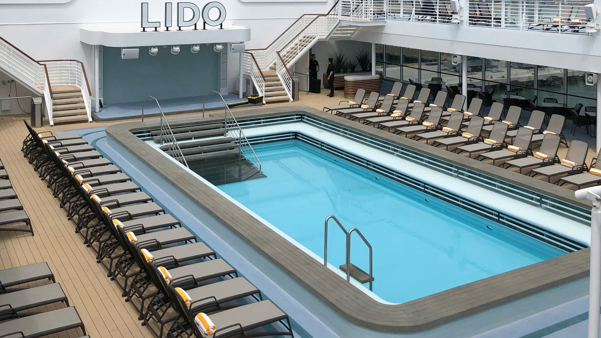 white and brown swimming pool during daytime
