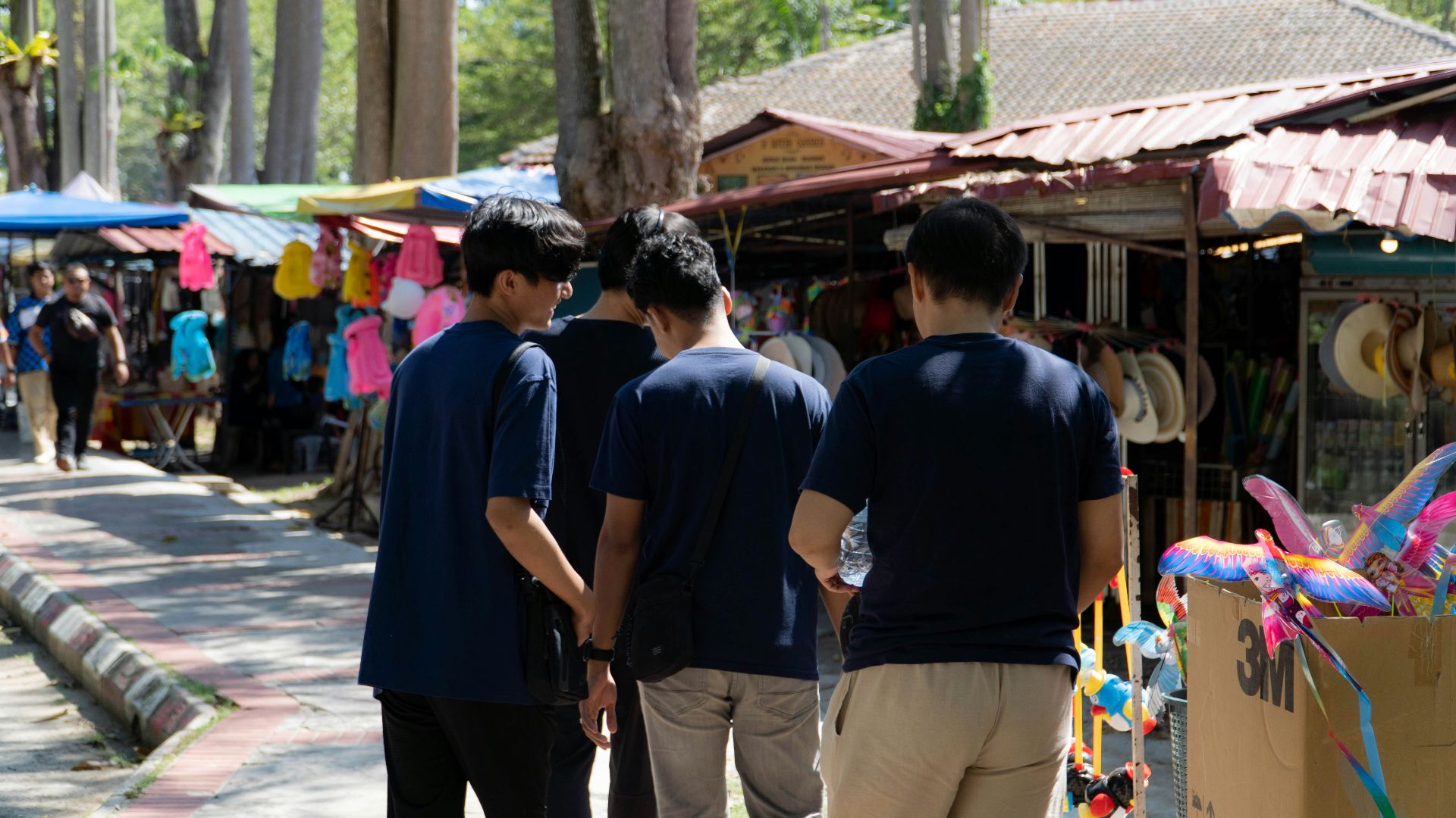 a group of young men standing next to each other
