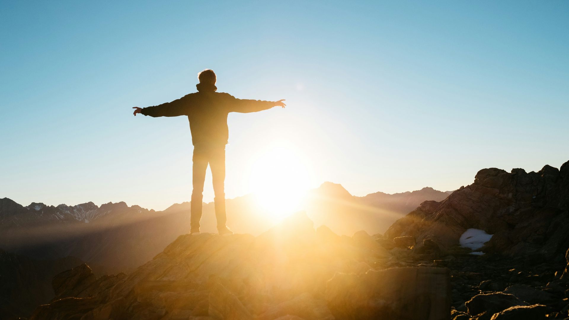 person standing on hill