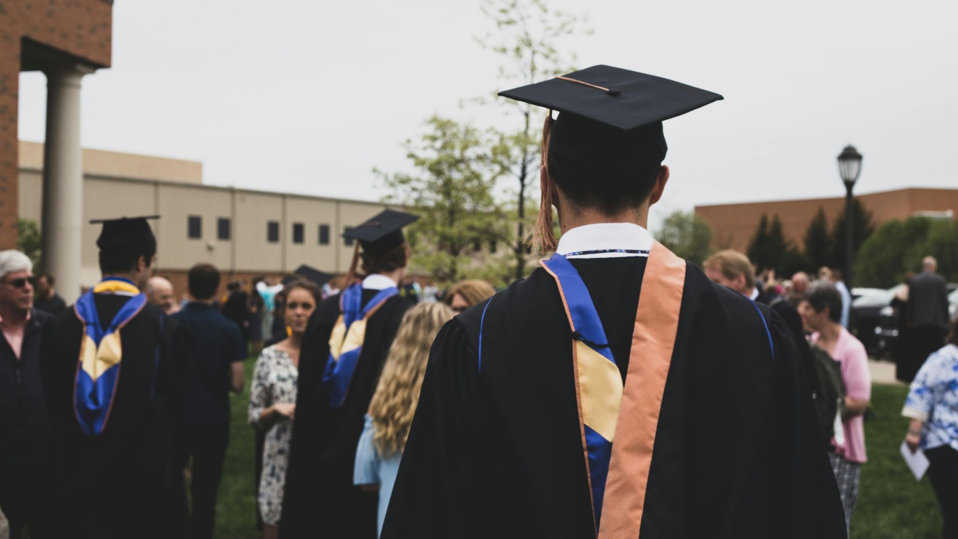 man wearing academic gown