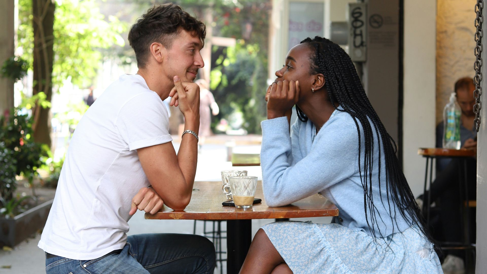 a man and a woman sitting at a table