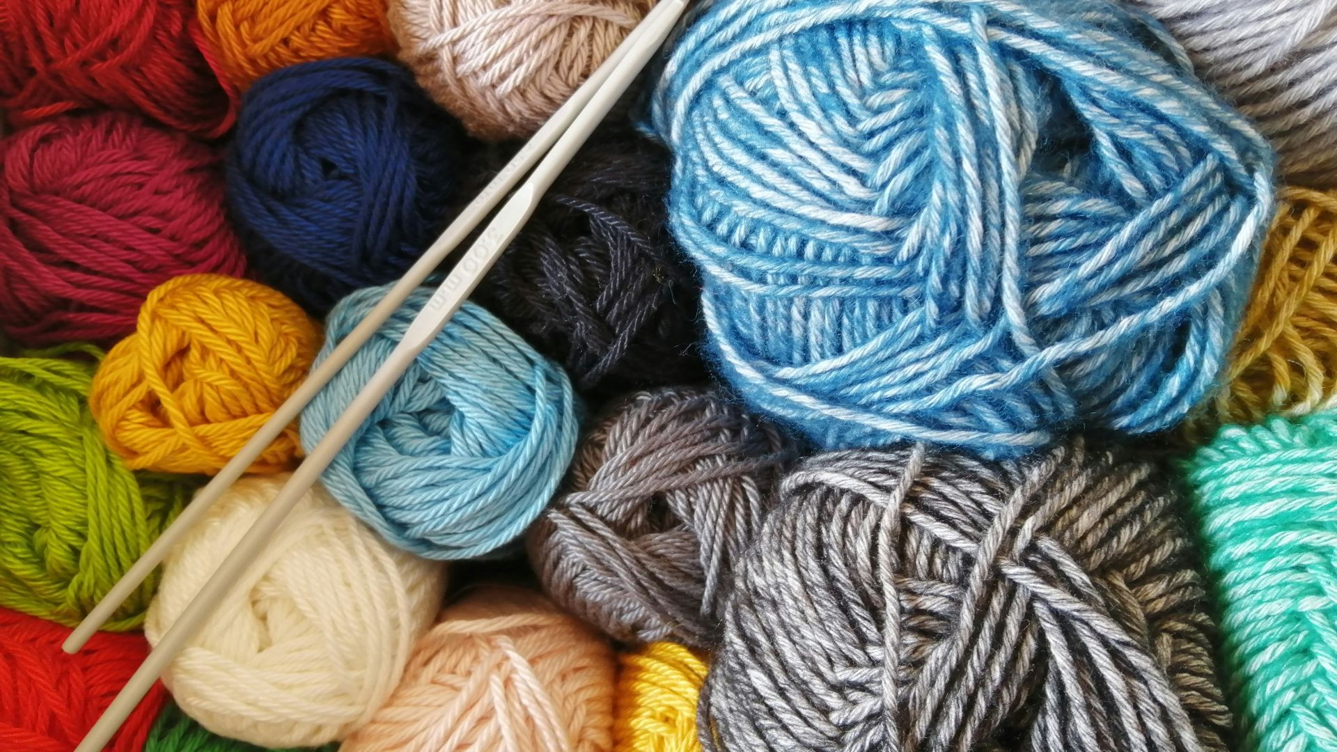 orange blue and white yarn