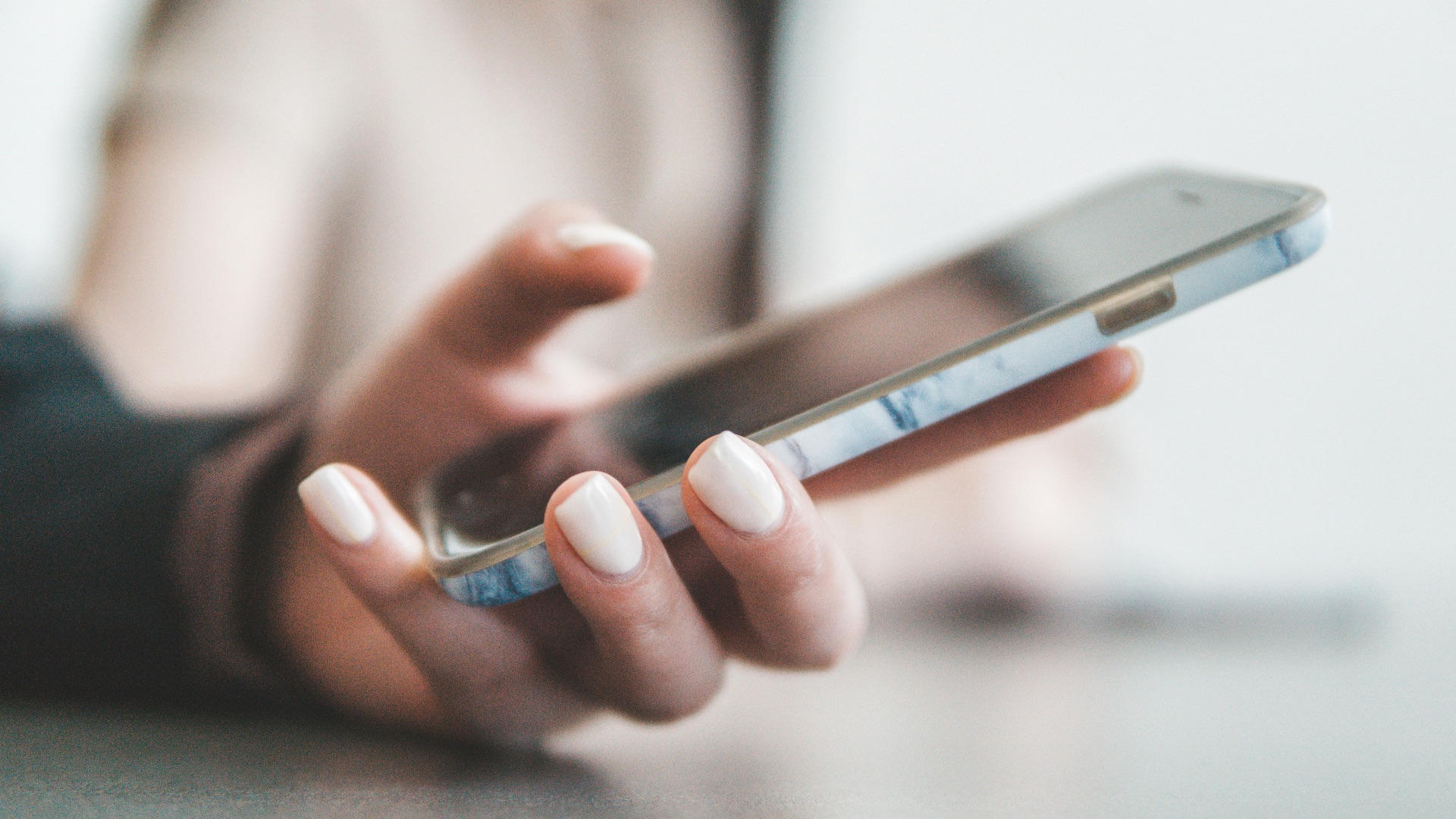 person holding black smartphone