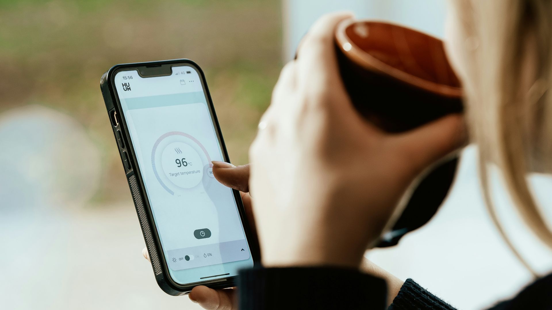 a person holding a cell phone