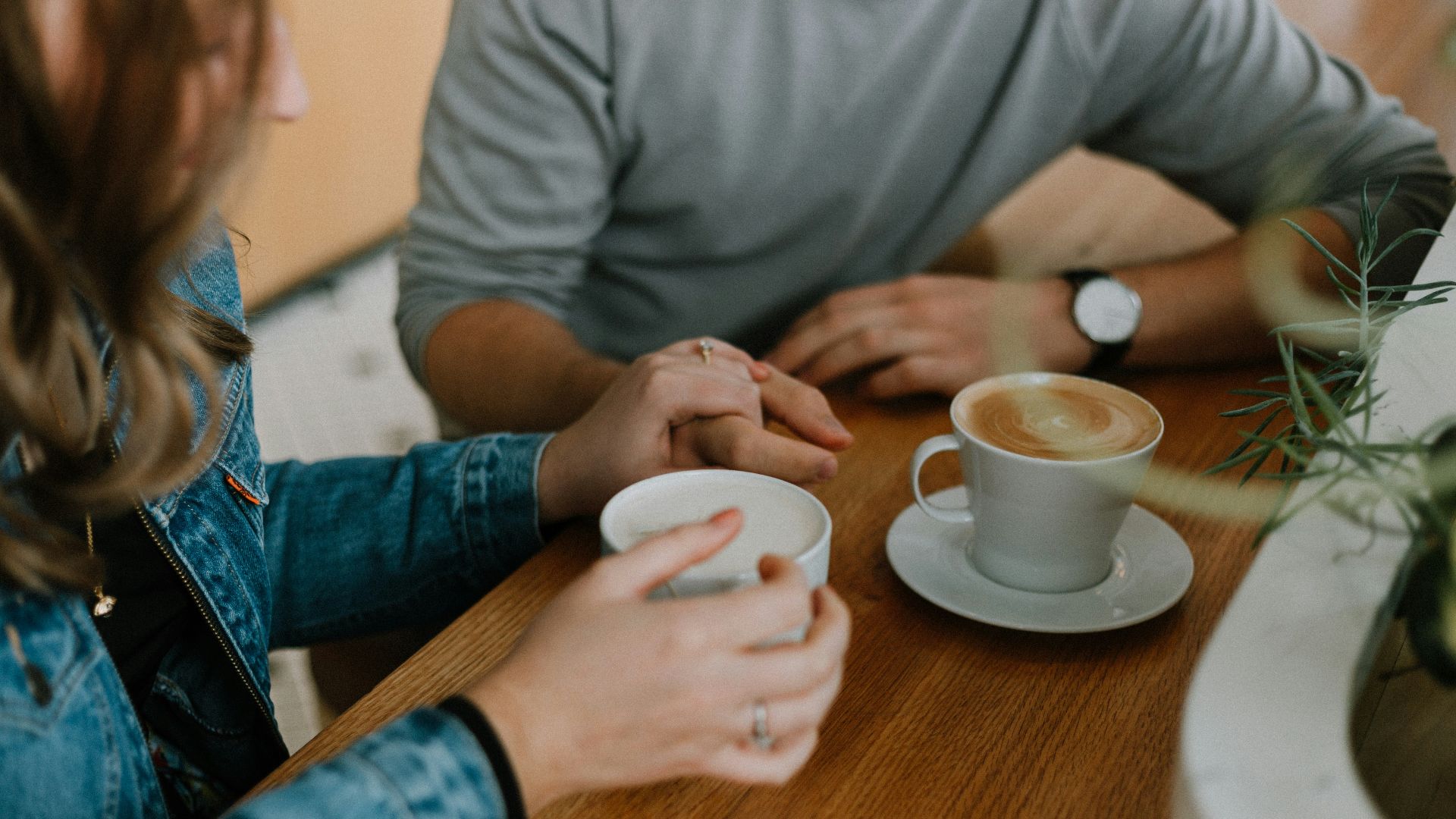 two mugs with coffee on table