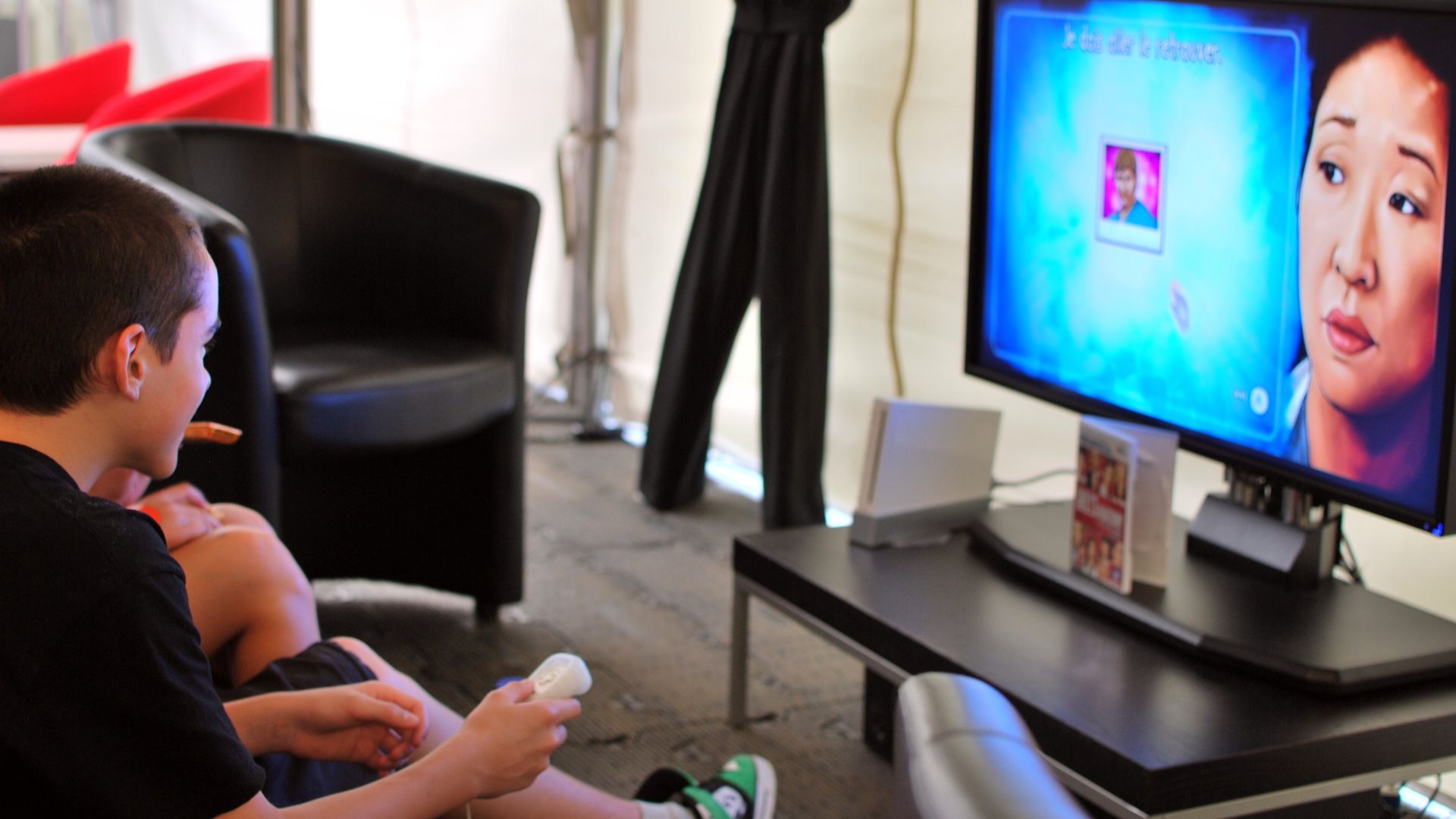 File:Boy playing wii game.jpg