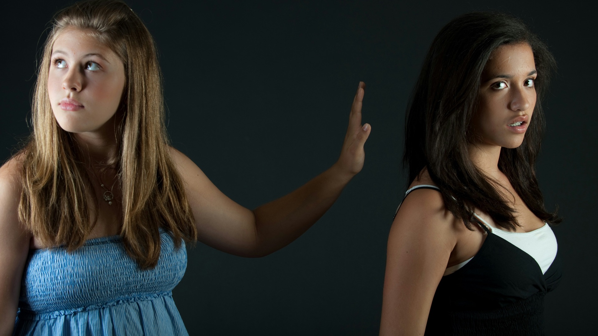 girl in blue sleeveless dress