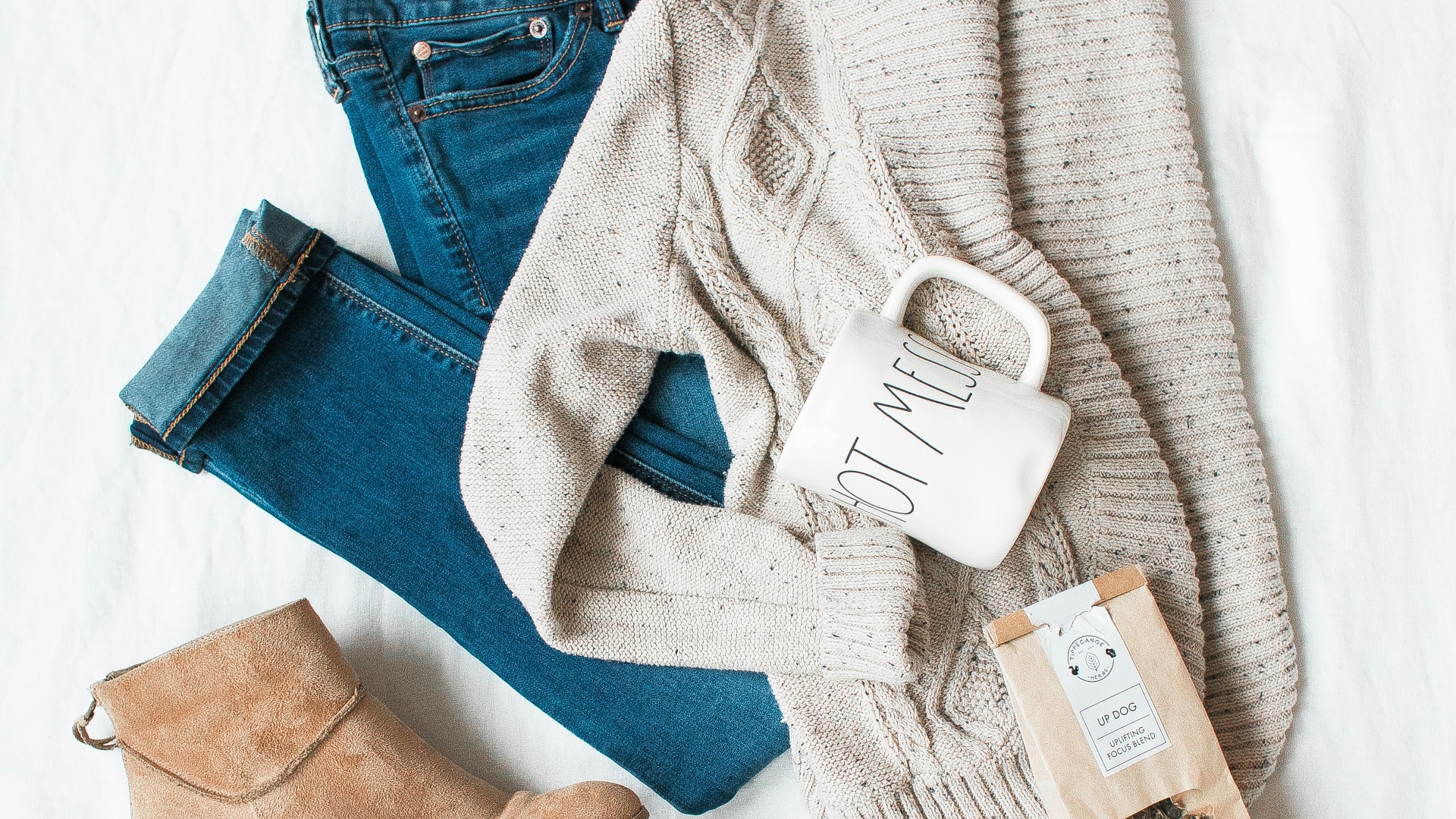 gray cardigan, blue jeans, and pair of brown chunky heeled shoes