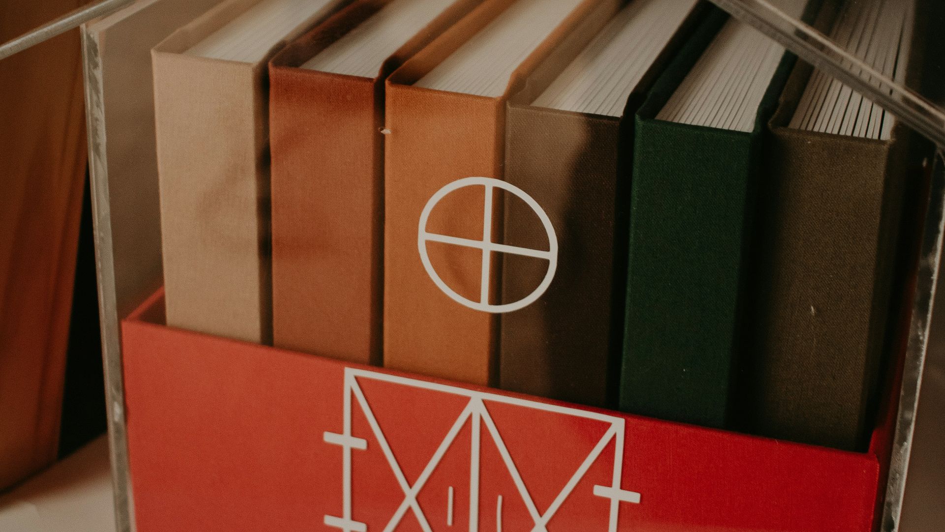 a shelf with a bunch of books on it