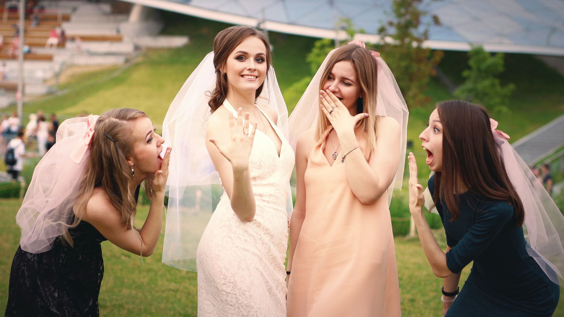a group of young women standing next to each other