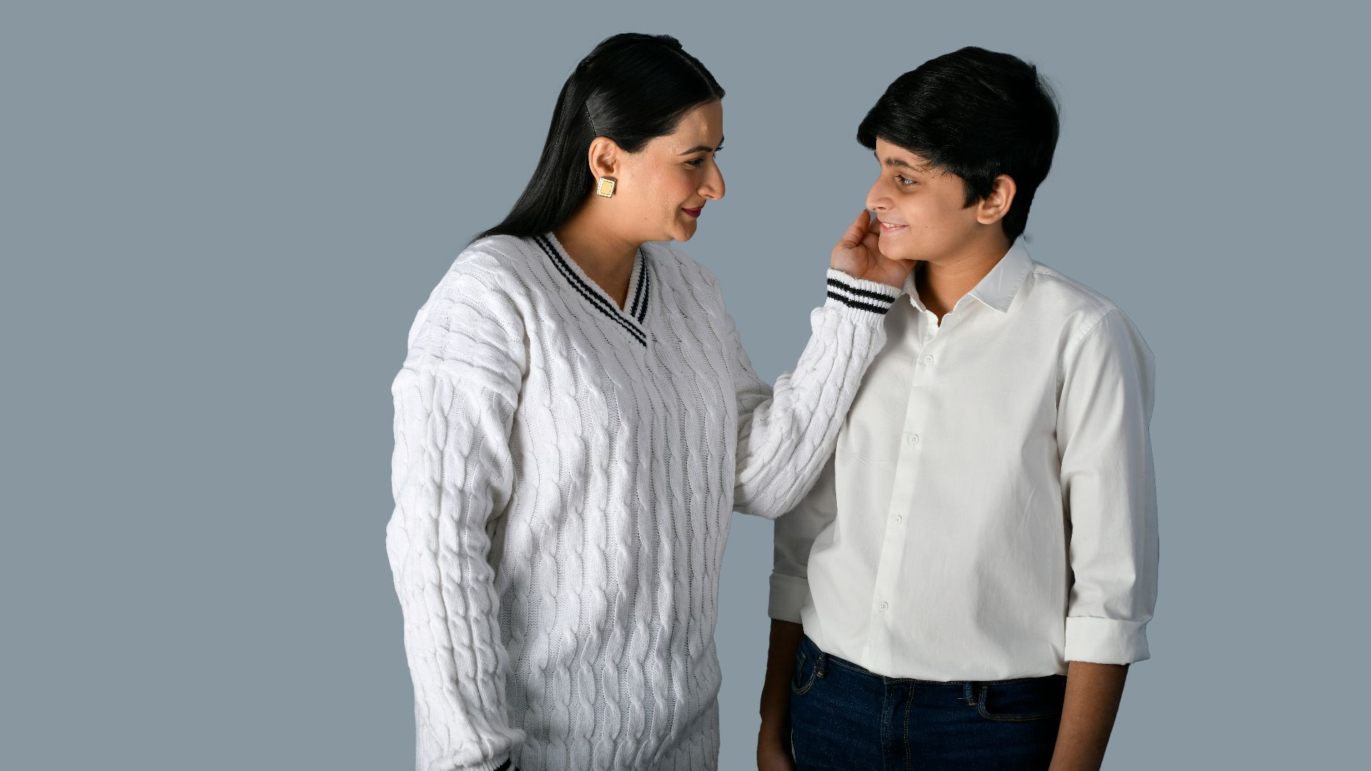 a man and woman looking at each other