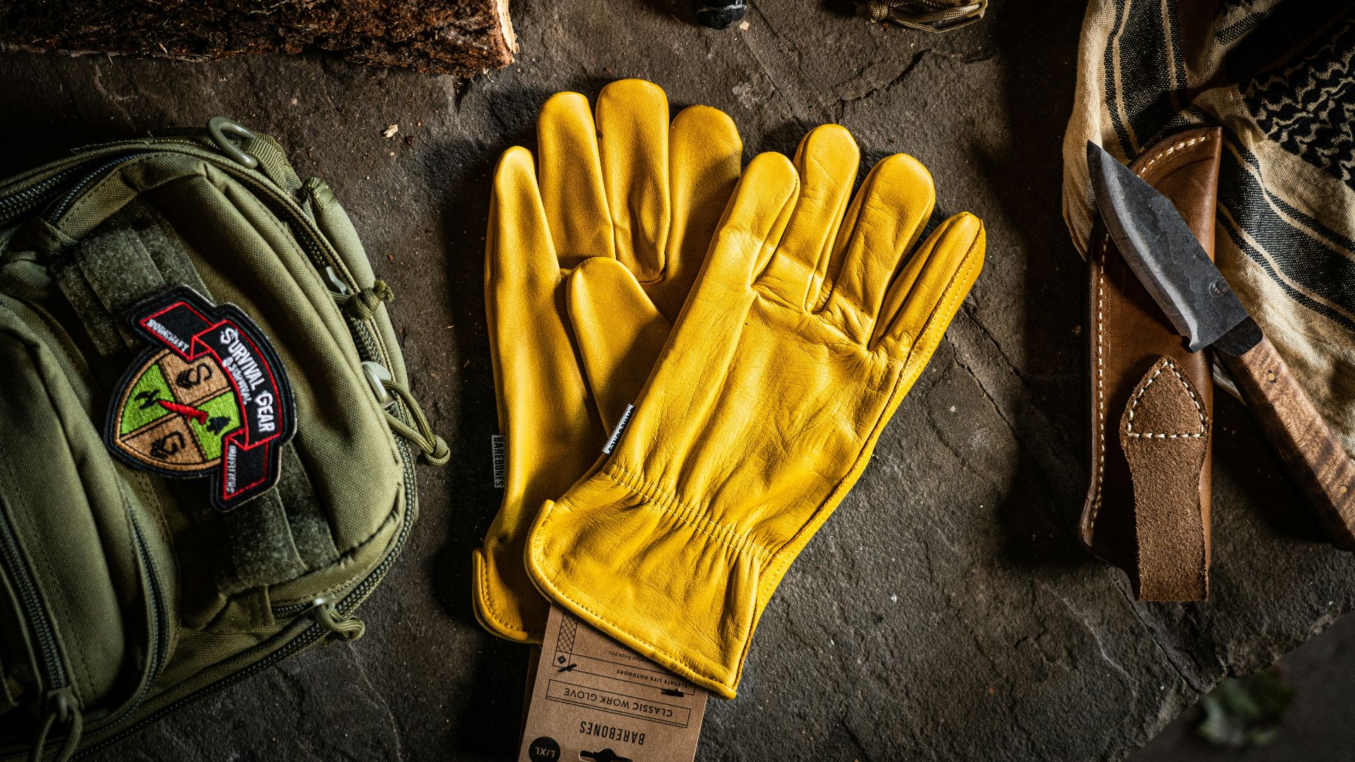 a pair of yellow gloves sitting on top of a table