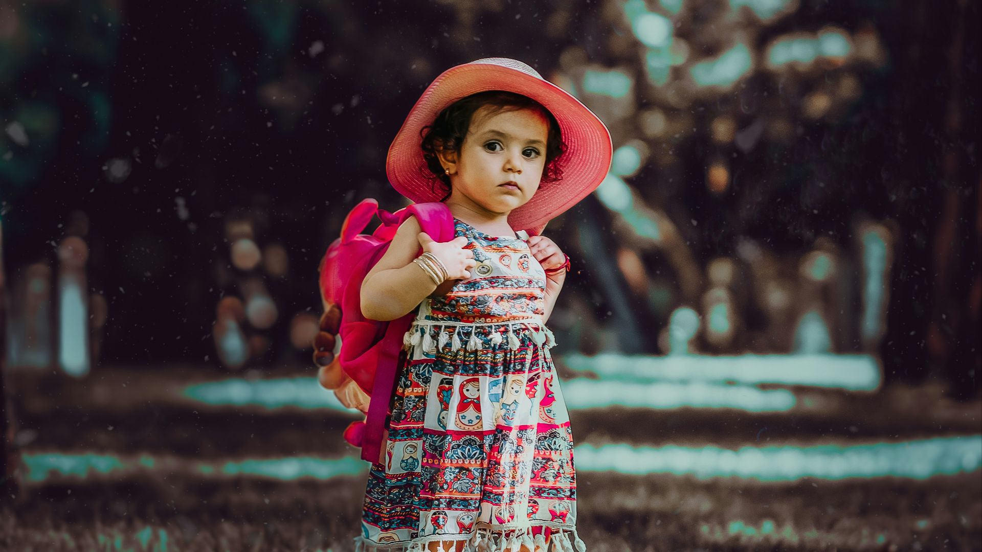 toddler carrying backpack