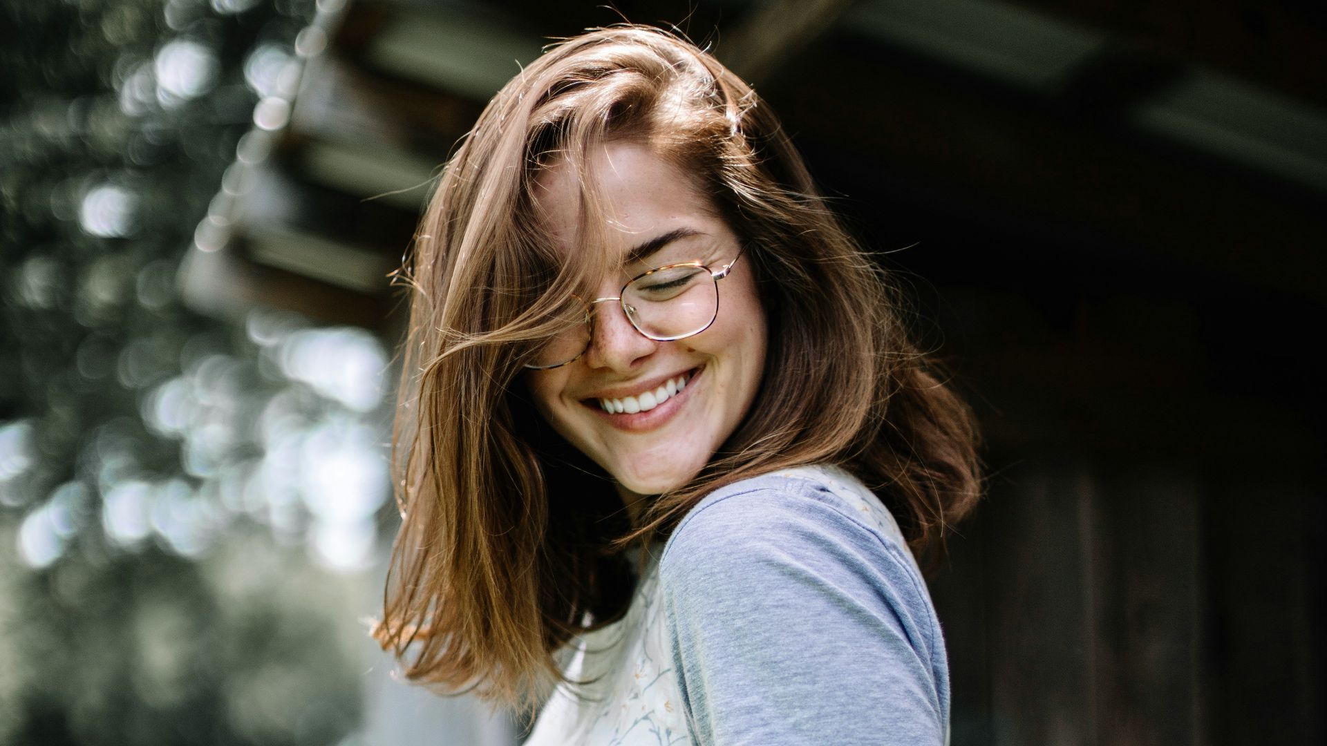 woman standing near house