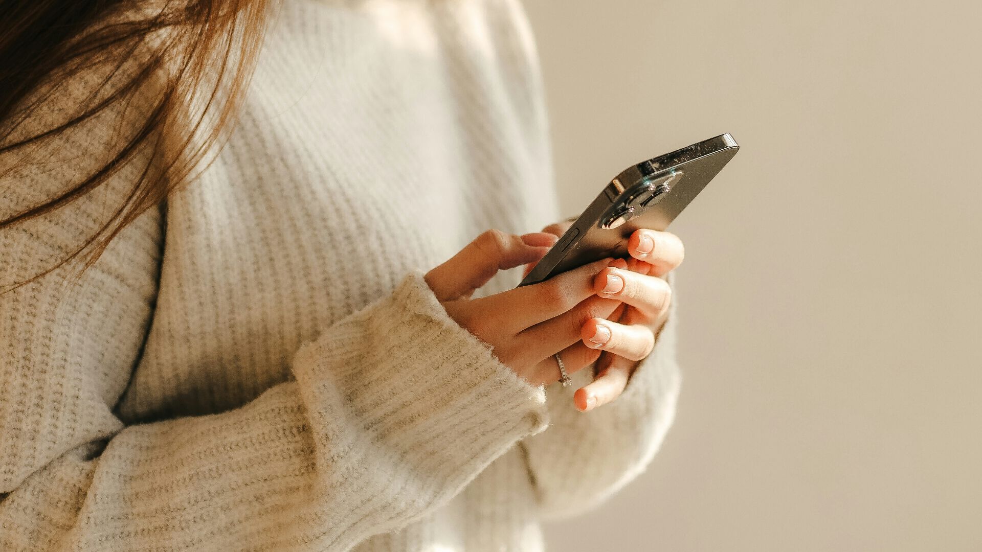 a woman looking at her phone