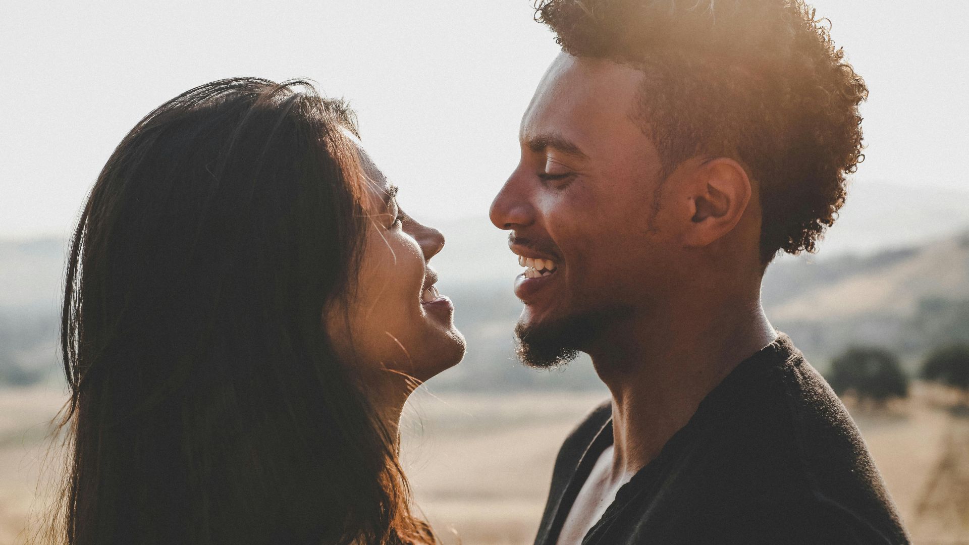 man and woman facing