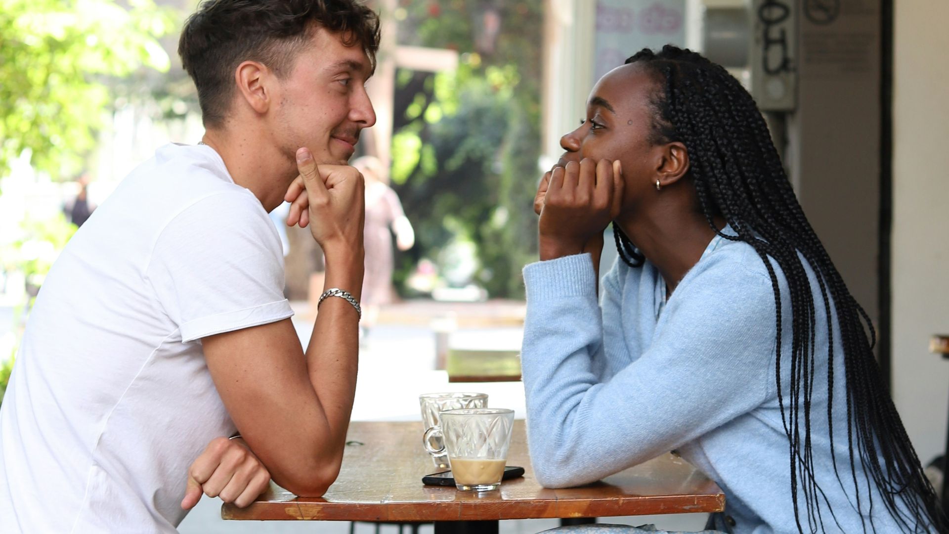 a man and a woman sitting at a table