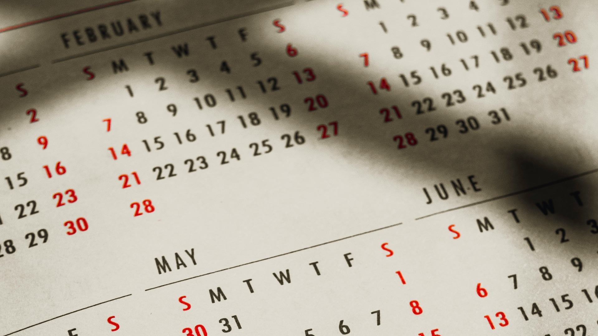 a close up of a calendar on a table