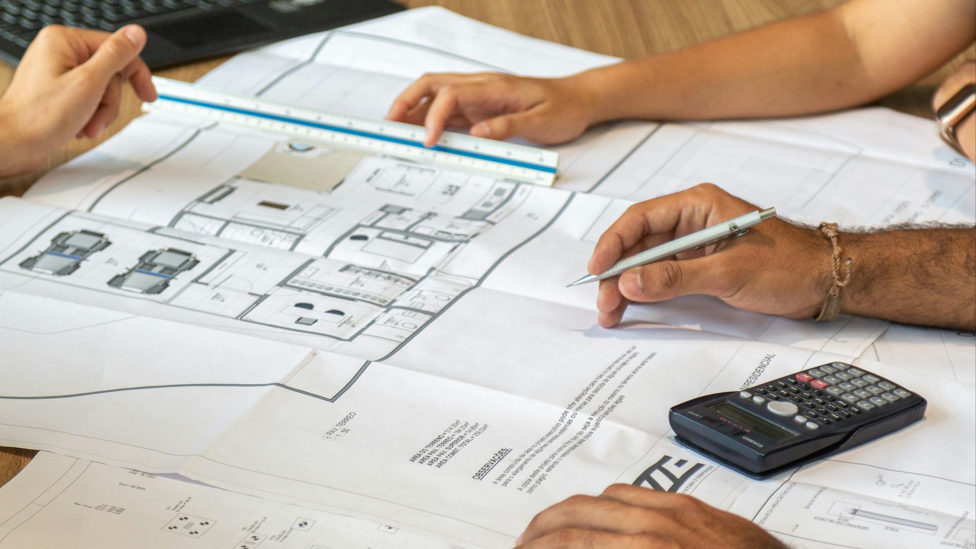 person writing on white paper