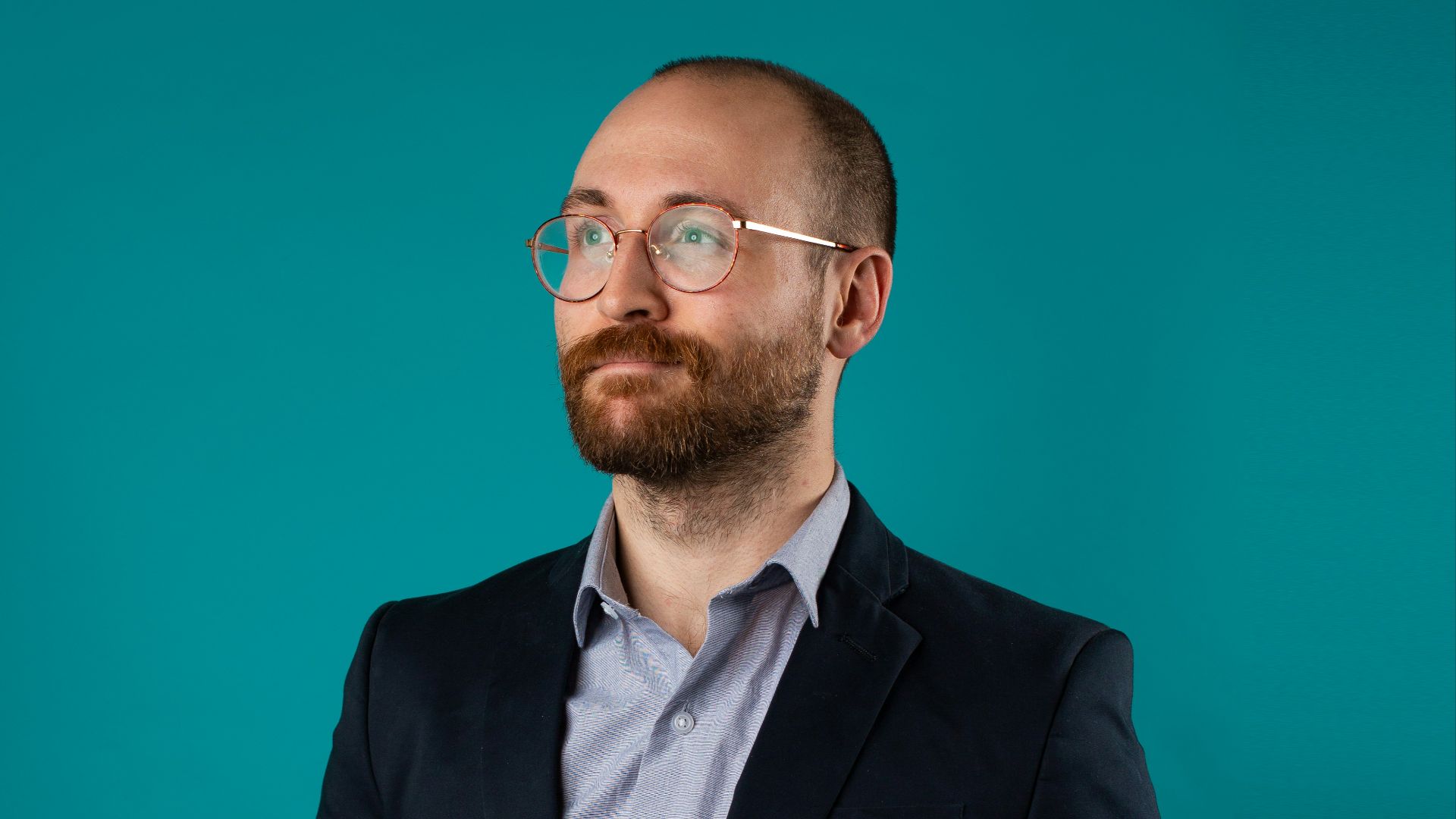 man wearing black suit