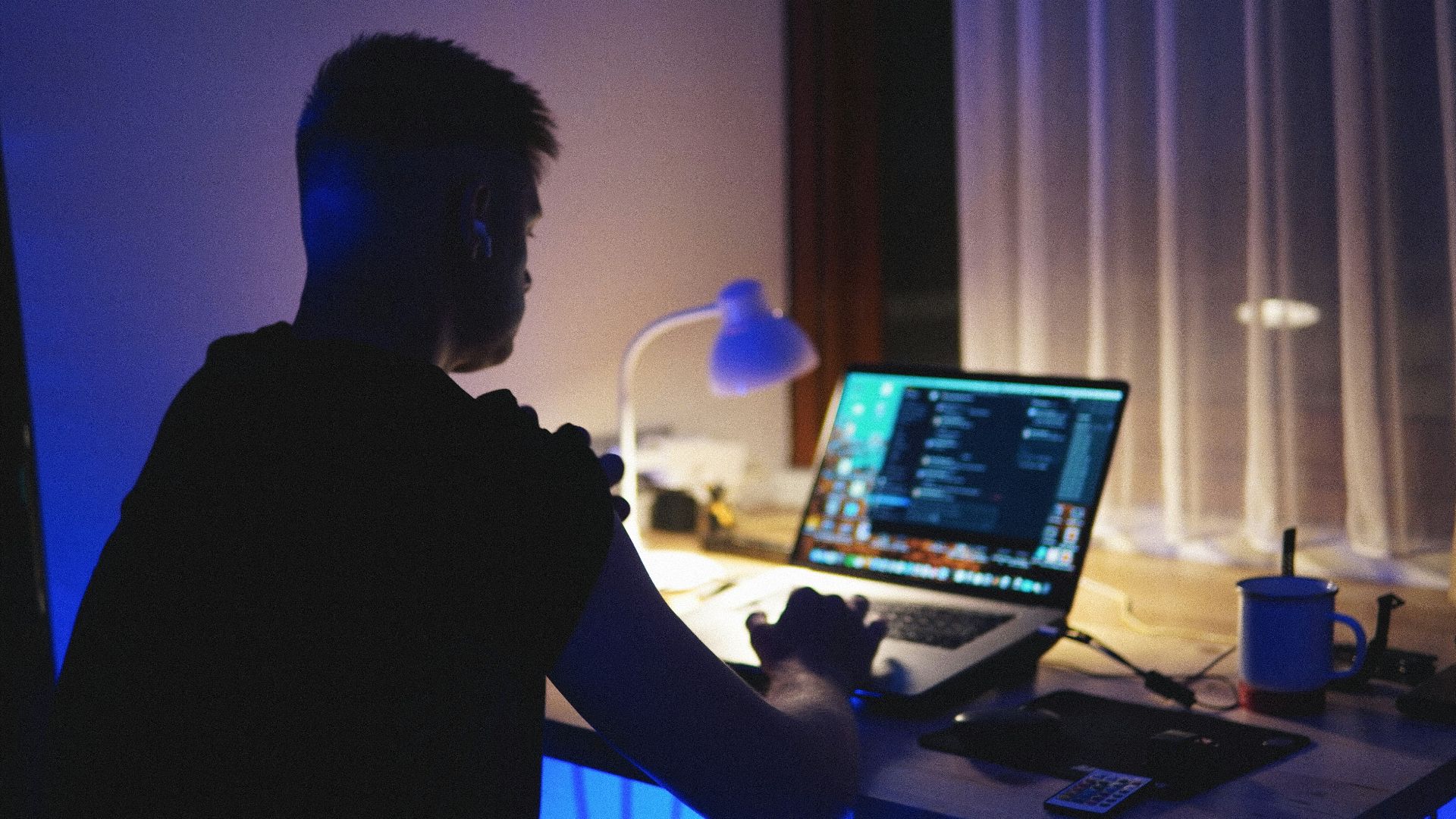 a man using a laptop