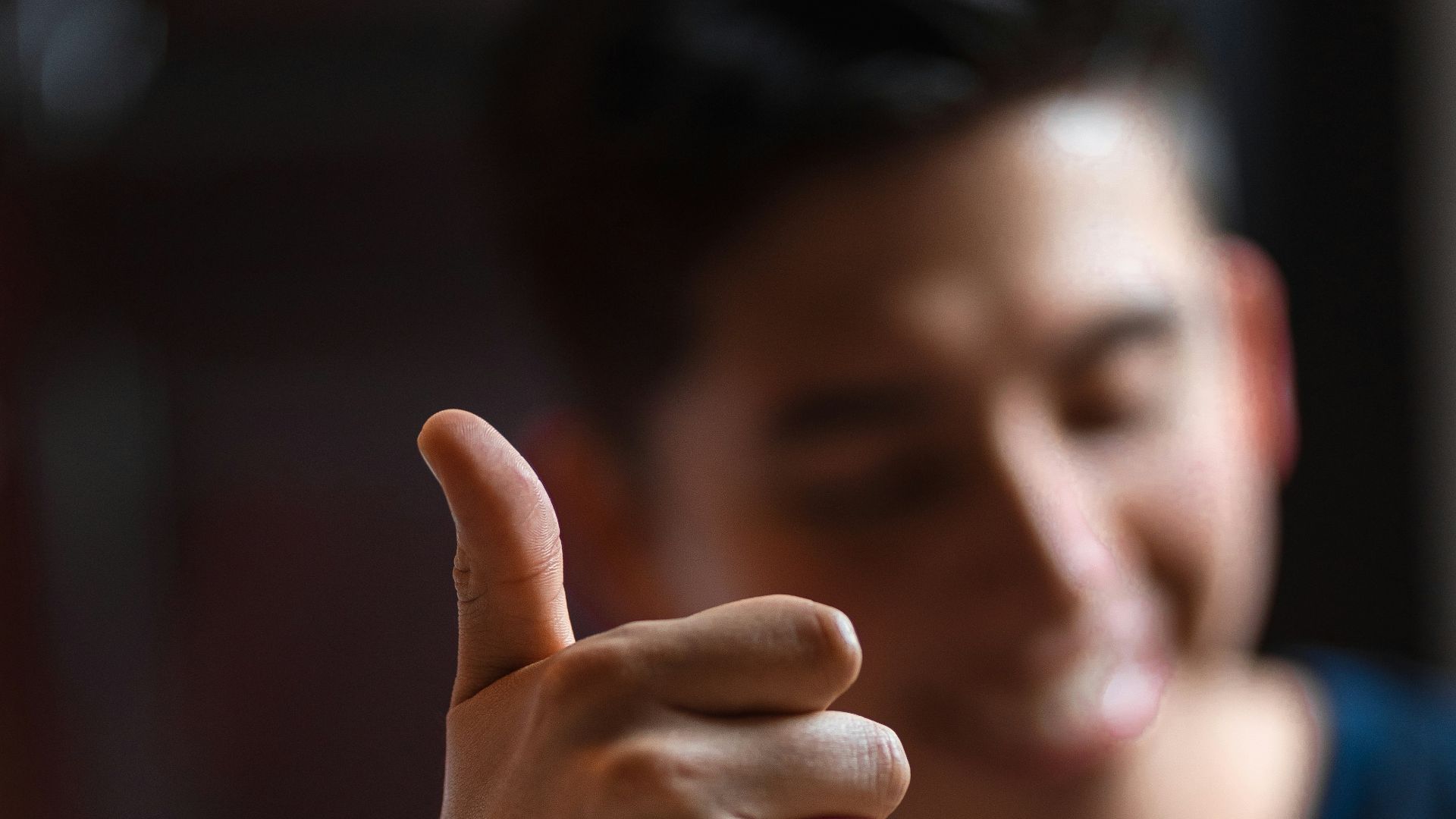 man wearing blue crew-neck shirt