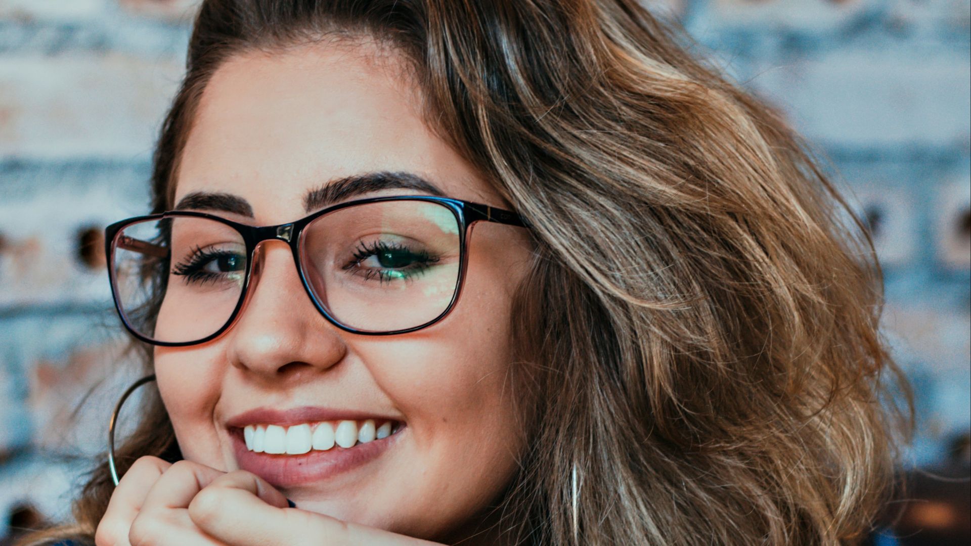 closeup photo of woman wearing black framed eyeglasses