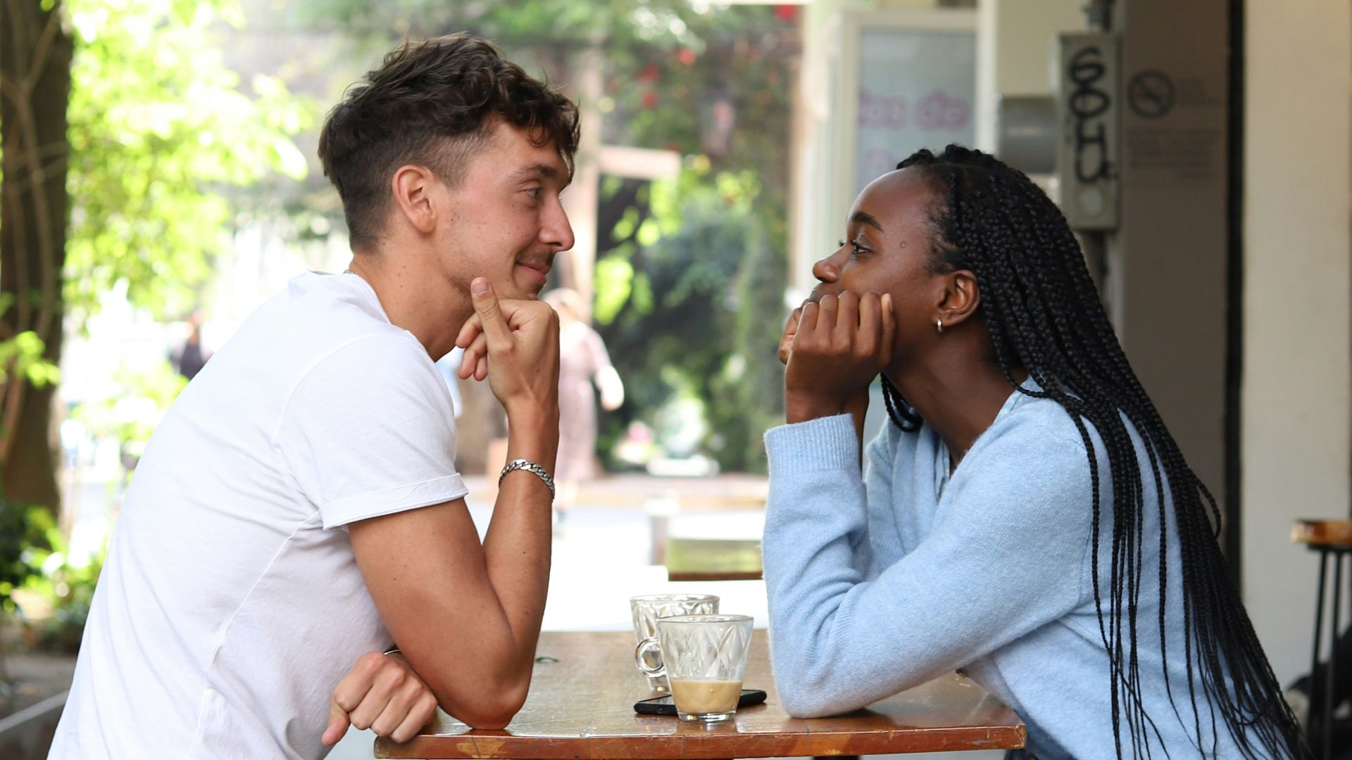 a man and a woman sitting at a table