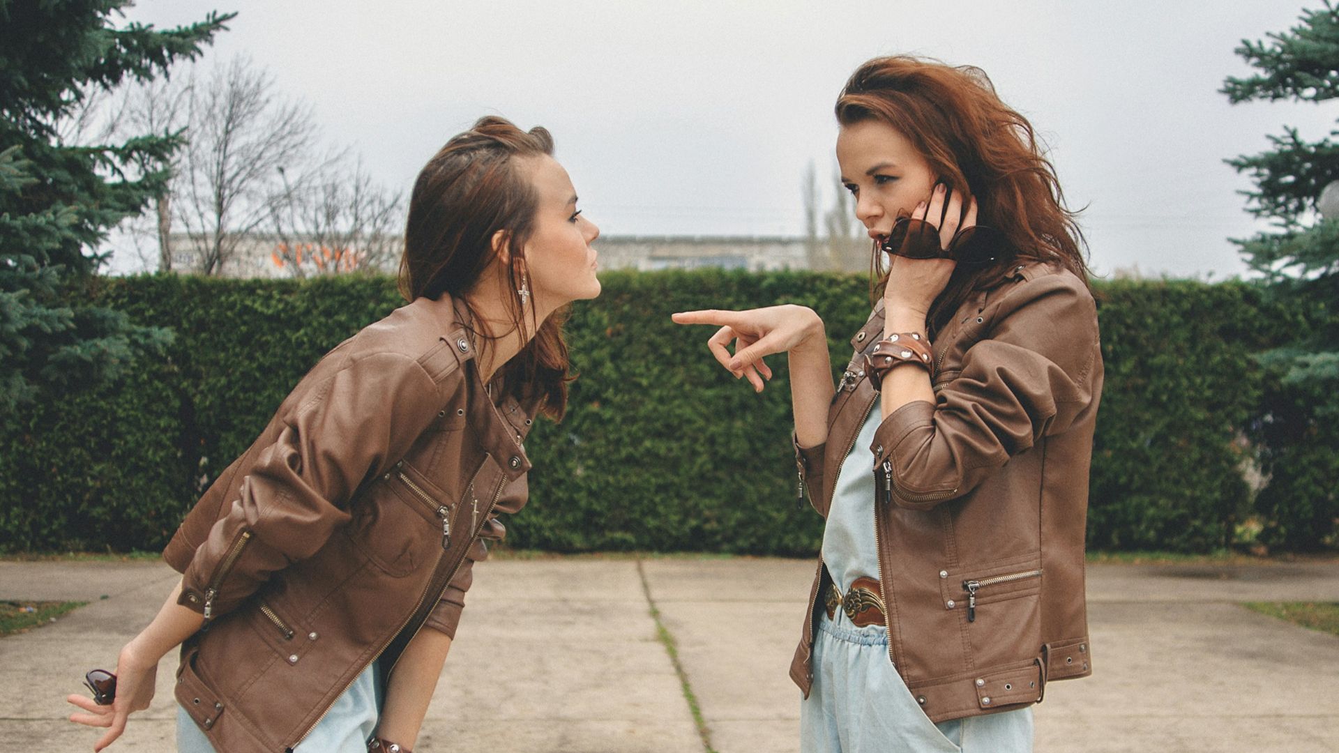 two young women standing next to each other
