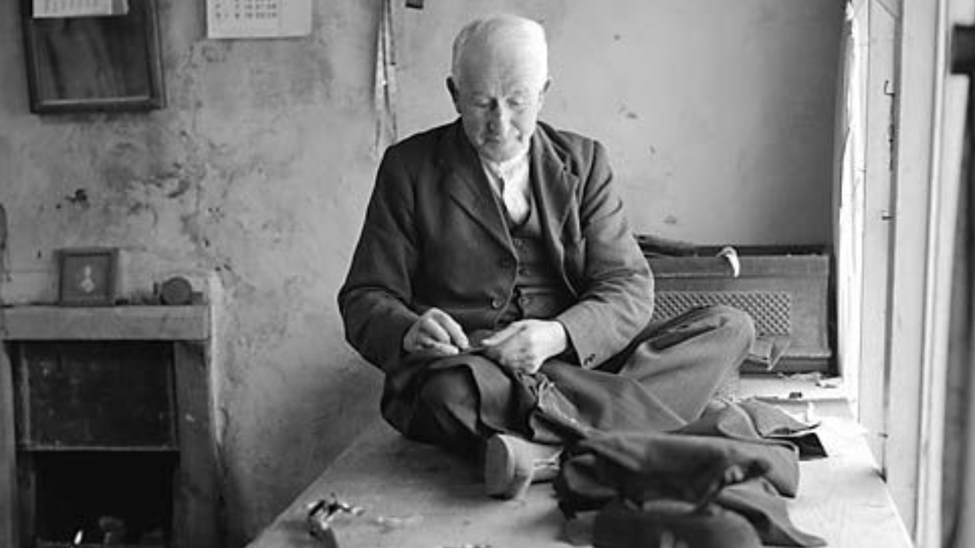 File:A Tailor at Work (6920059143).jpg