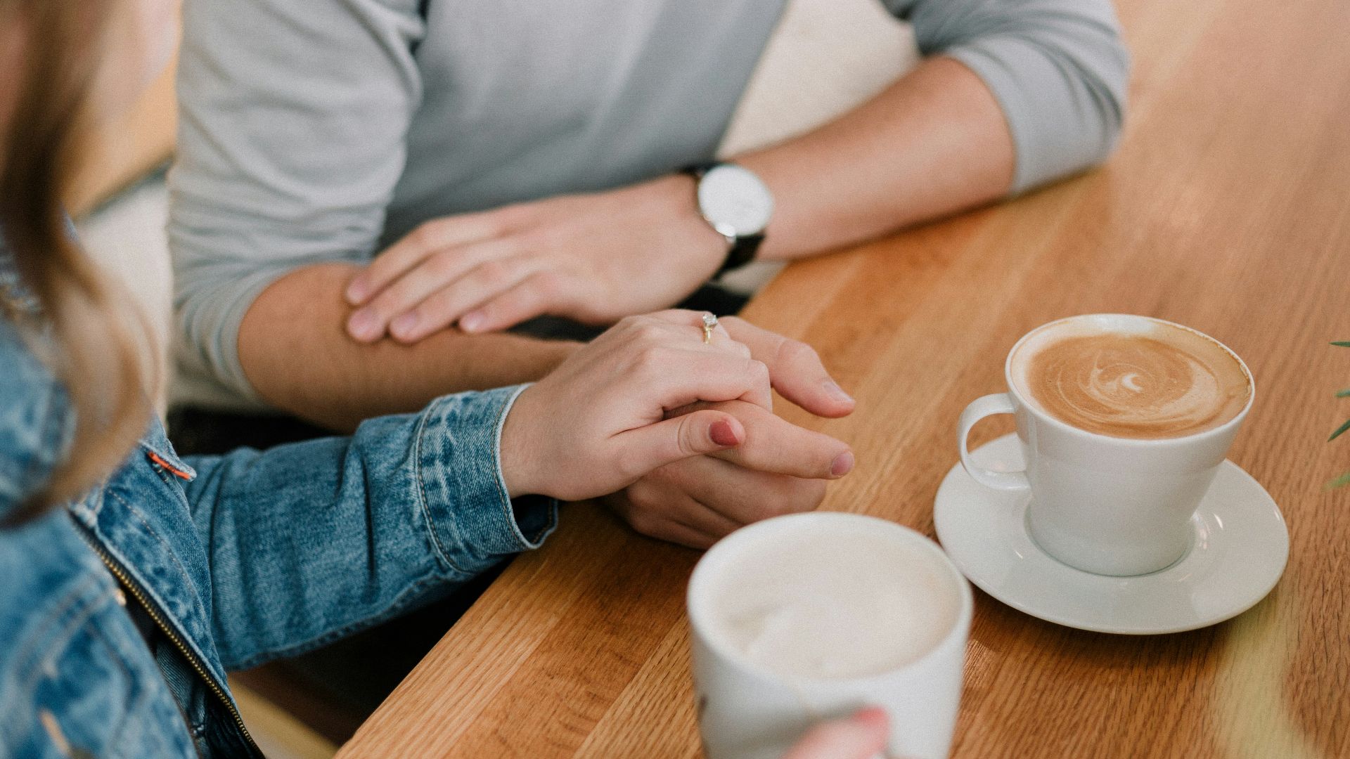 man and woman holding hands