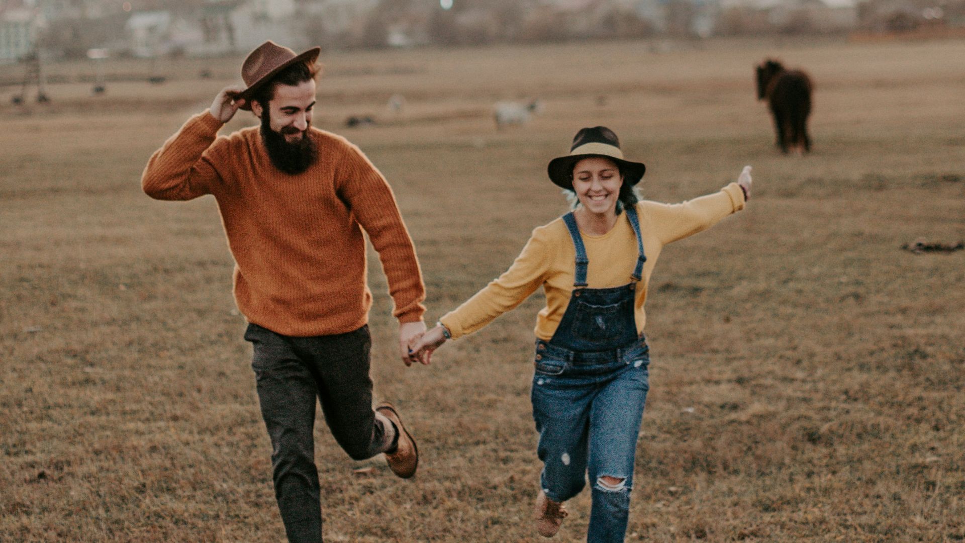 man holdind woman hand