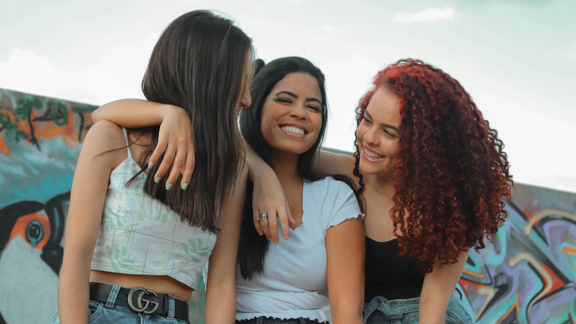 a group of young women standing next to each other