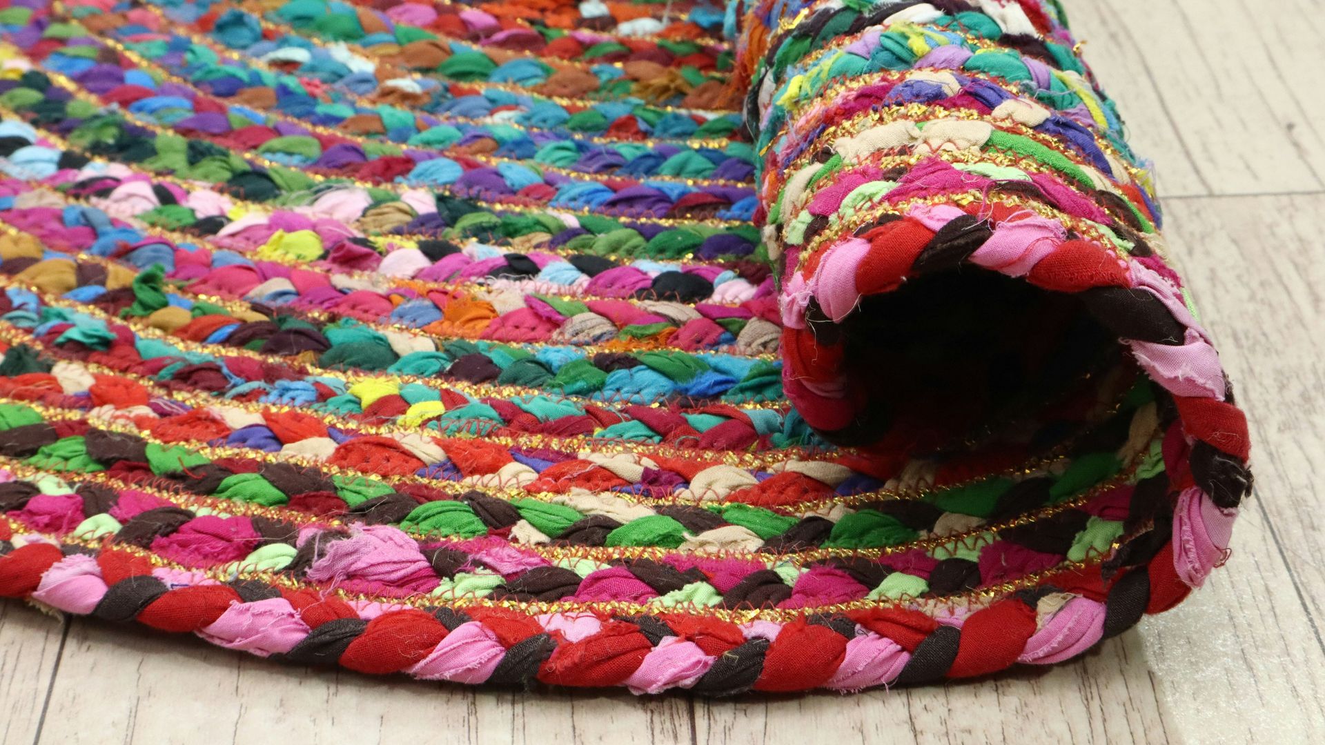 Colorful braided rug with intricate patterns