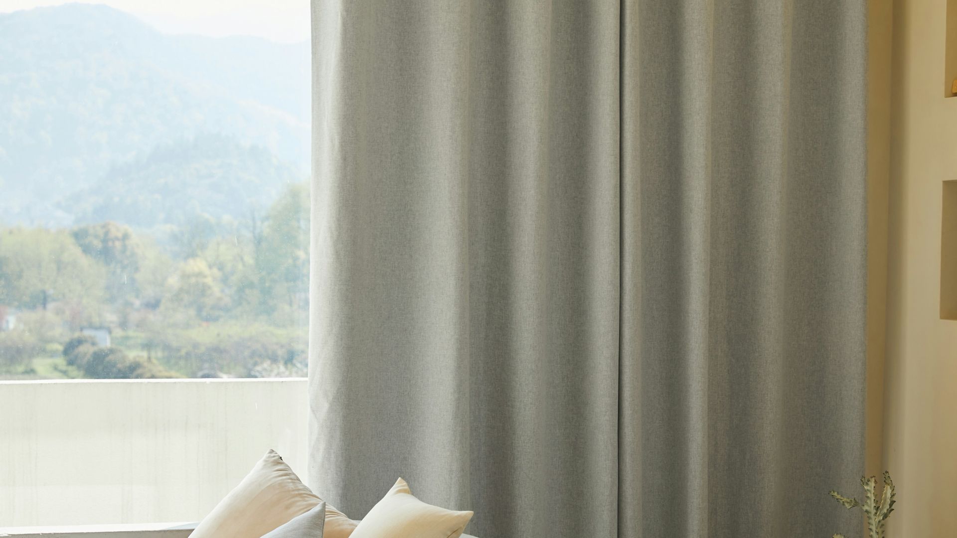 white throw pillow on white couch