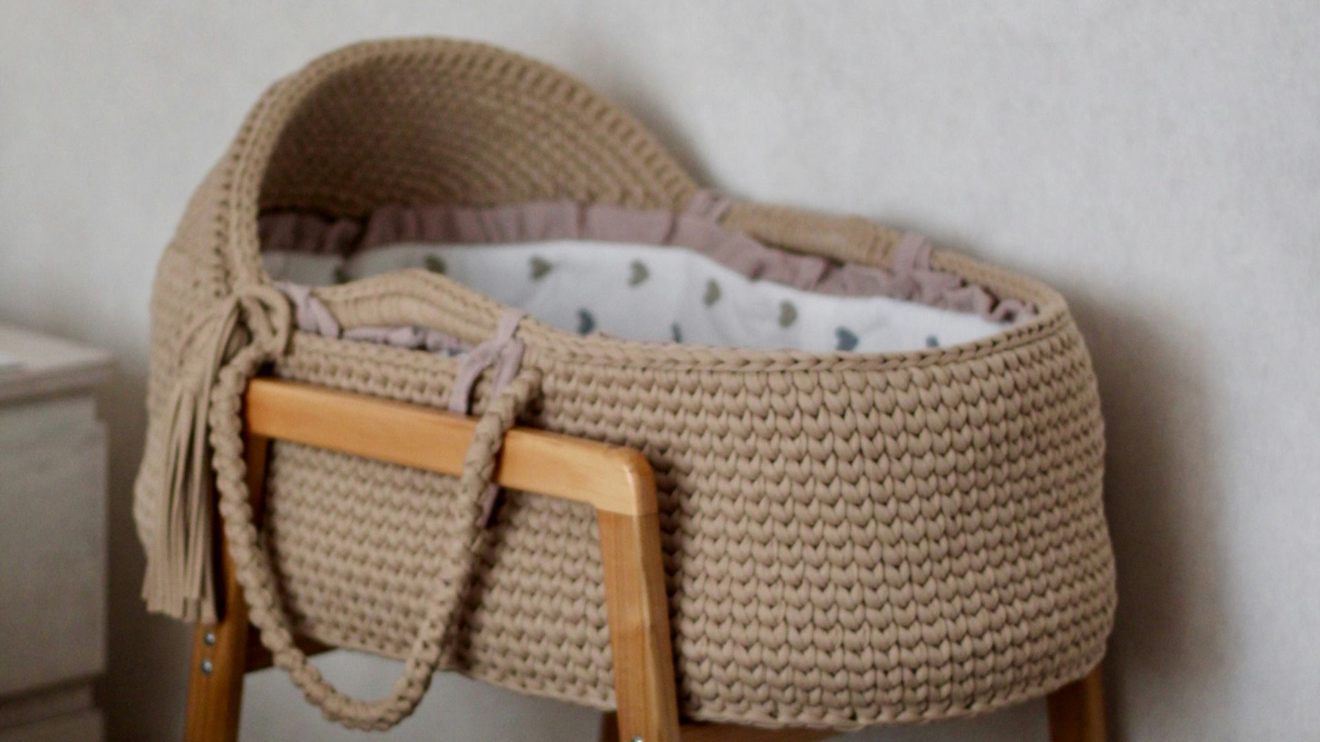 A bed with a basket on top of it
