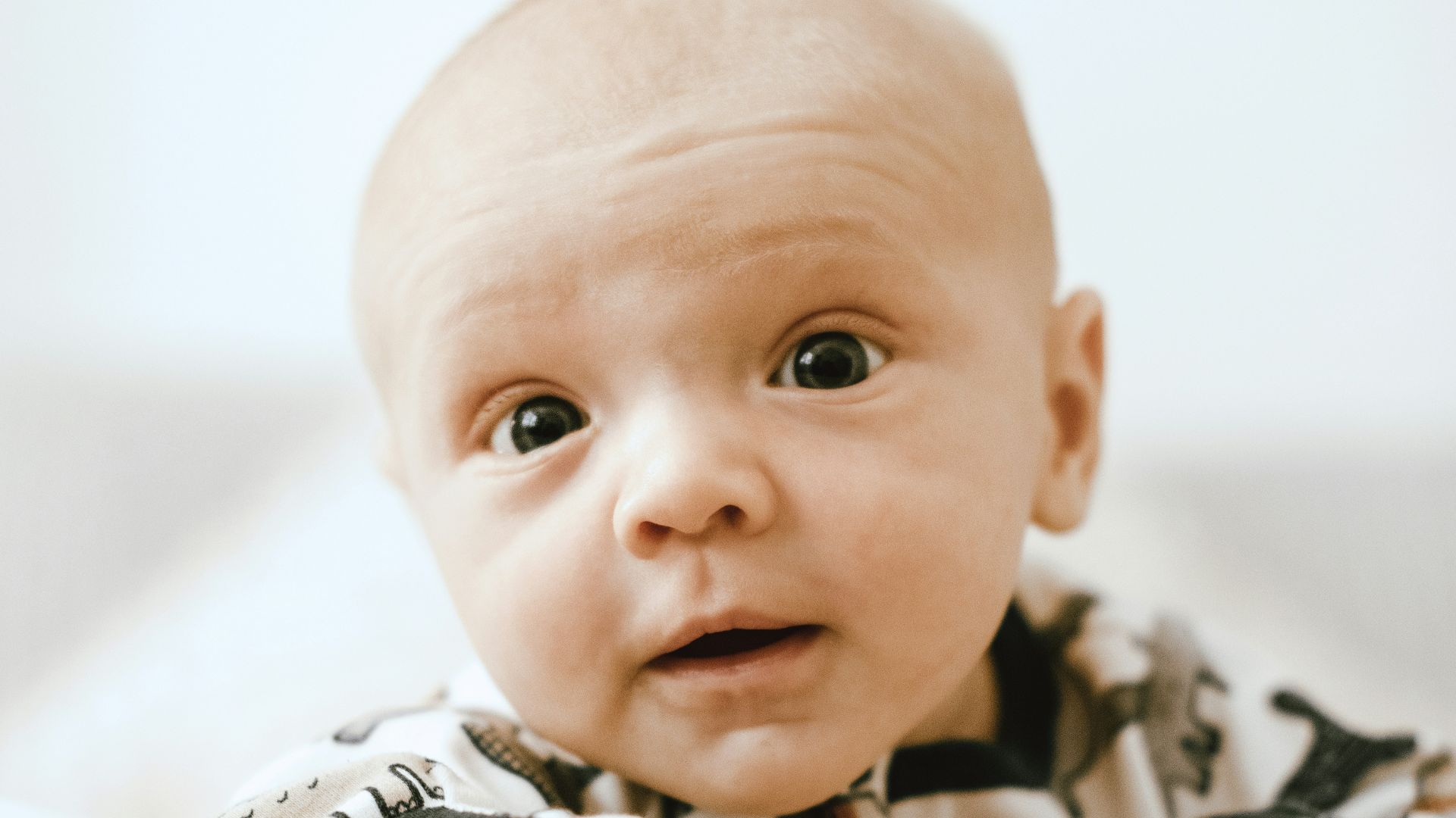 a baby with a white shirt