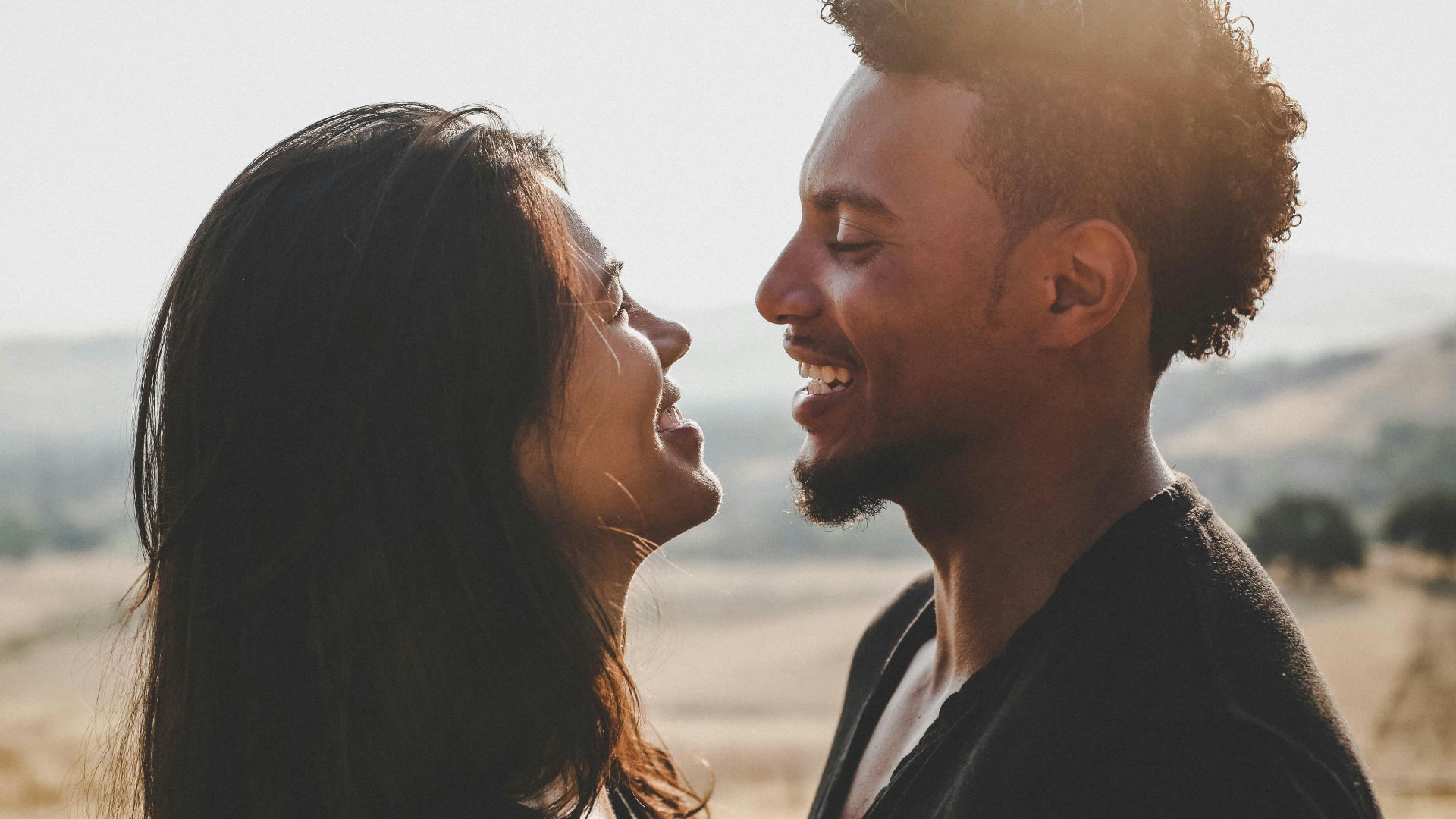 man and woman facing