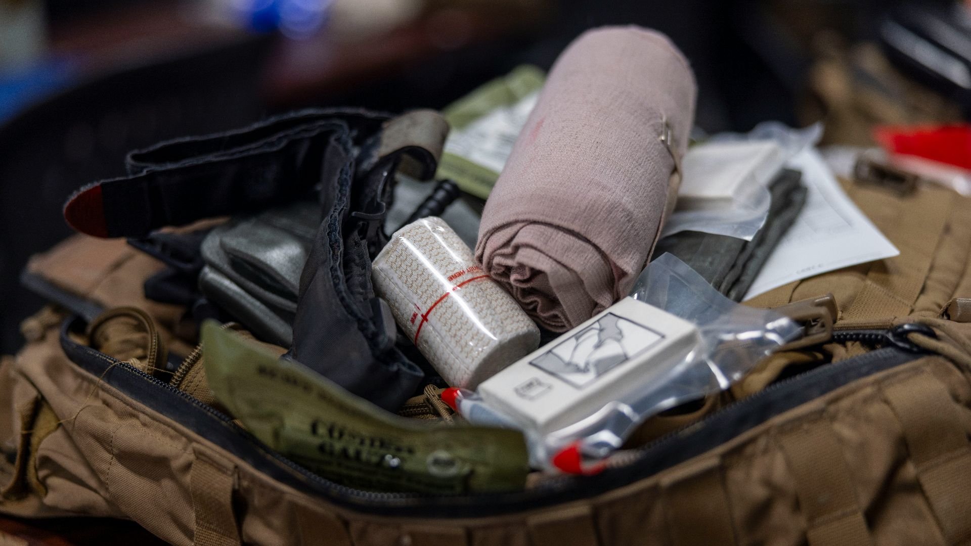 First aid kit contents with bandages and medical supplies